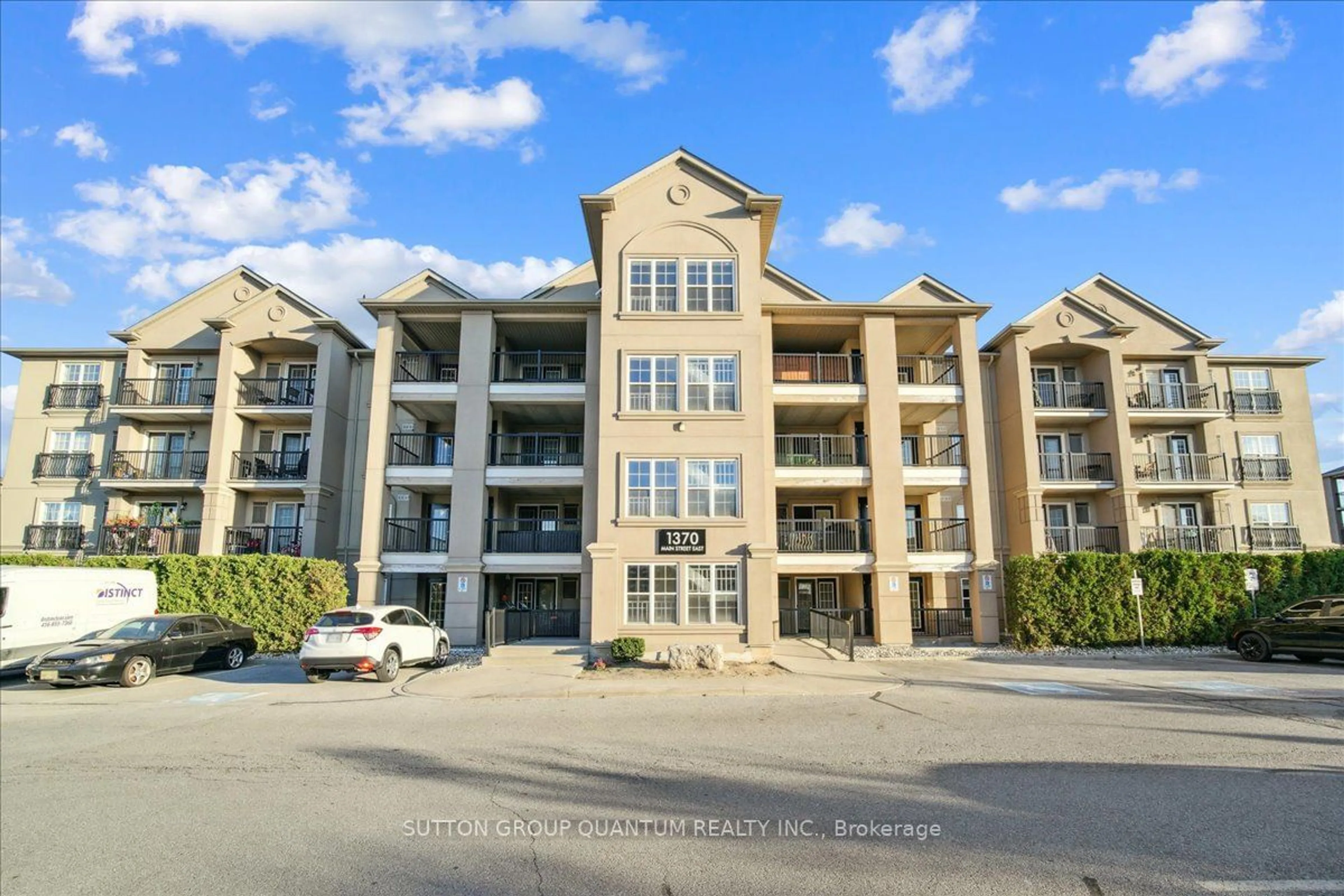 A pic from outside/outdoor area/front of a property/back of a property/a pic from drone, water/lake/river/ocean view for 1370 Main St #411, Milton Ontario L9T 7S8