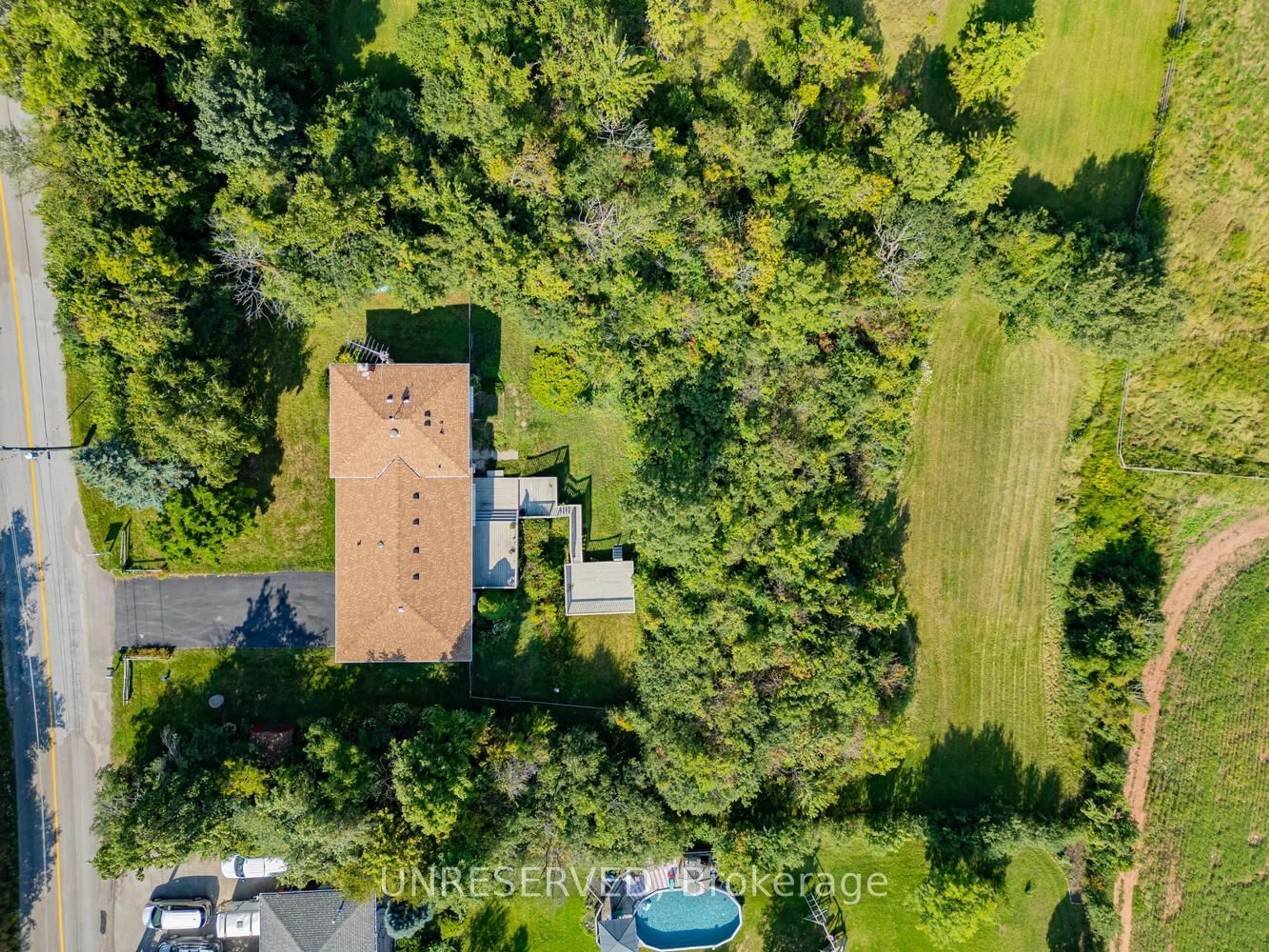 A pic from outside/outdoor area/front of a property/back of a property/a pic from drone, forest/trees view for 13074 Fallbrook Tr, Halton Hills Ontario L7G 4S8