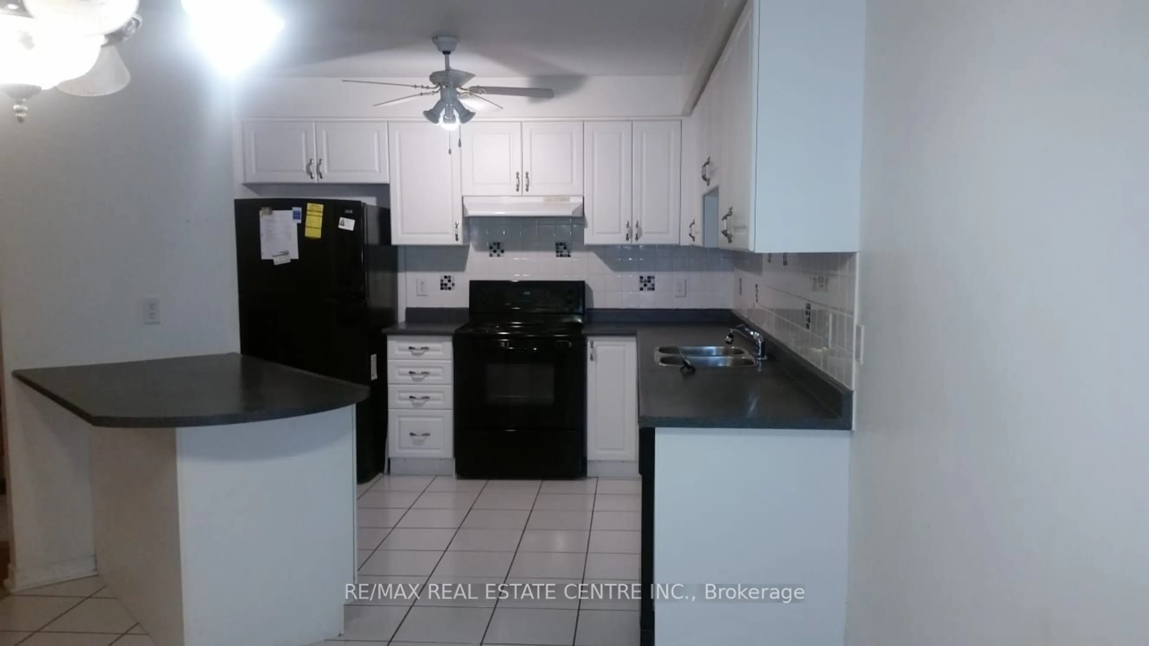 Standard kitchen, ceramic/tile floor for 65 Pauline Cres, Brampton Ontario L7A 2V5