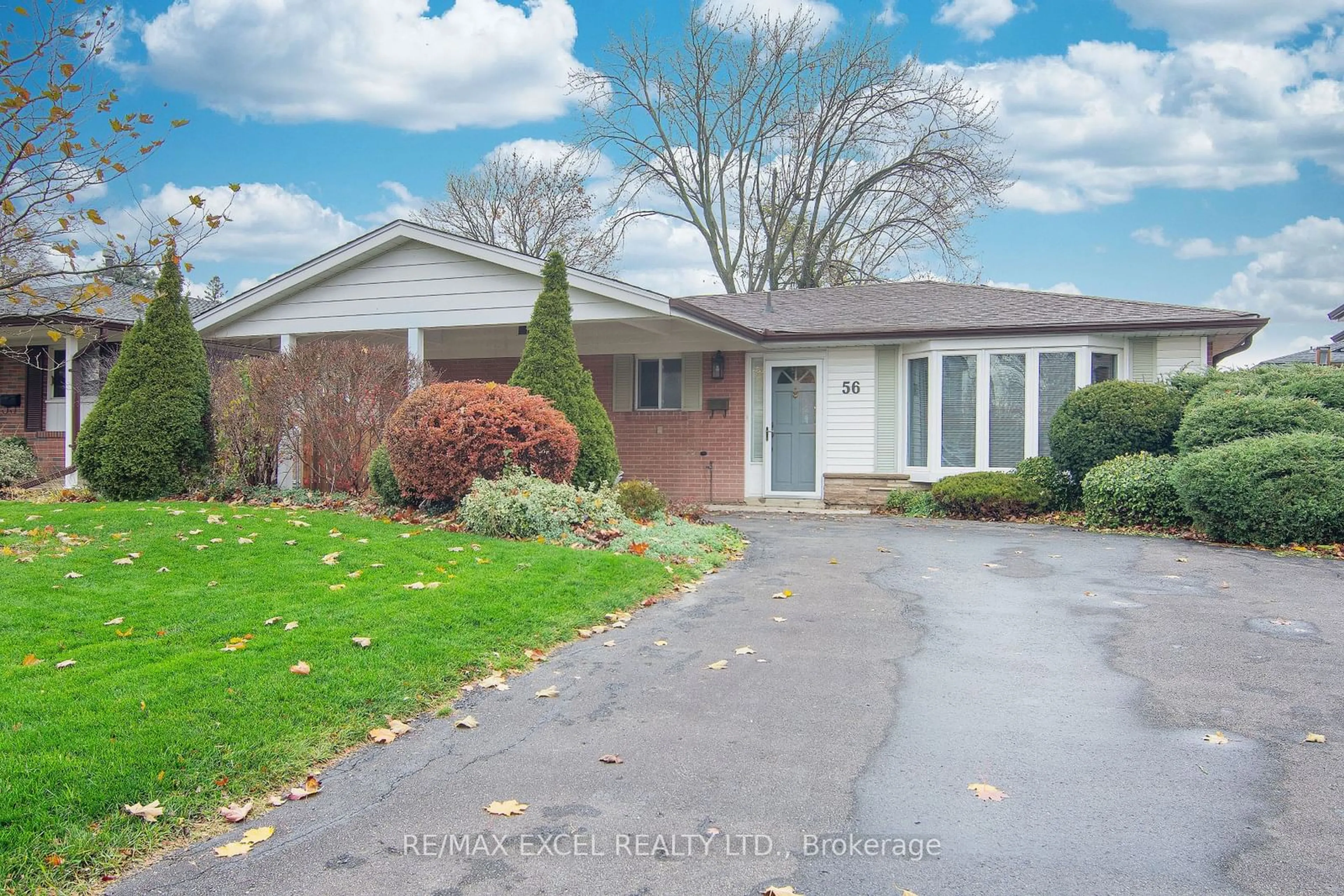 Home with brick exterior material, street for 56 Farmington Dr, Brampton Ontario L6W 2V2