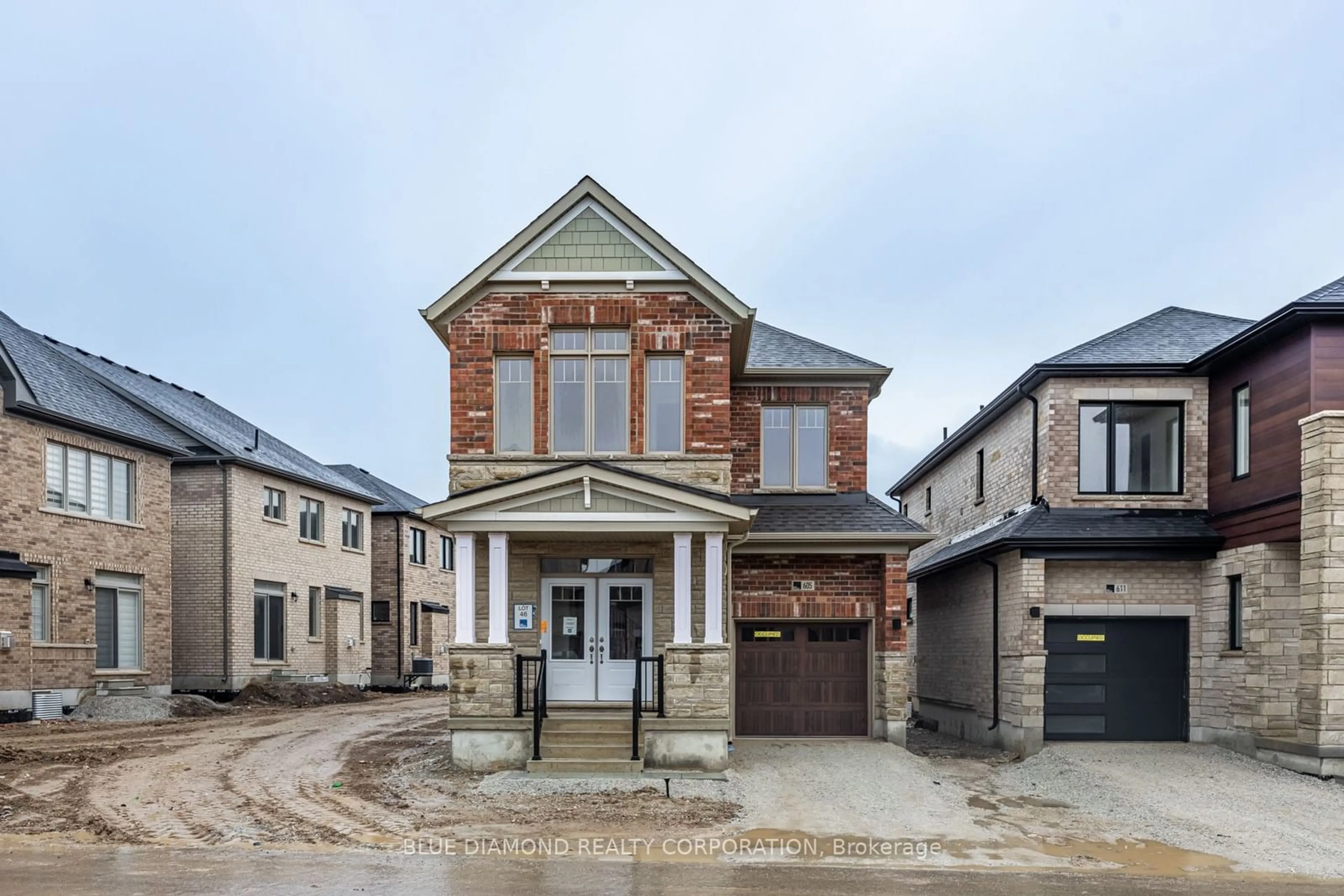 Home with brick exterior material, street for 605 BEARBERRY Pl, Milton Ontario L9E 1V1