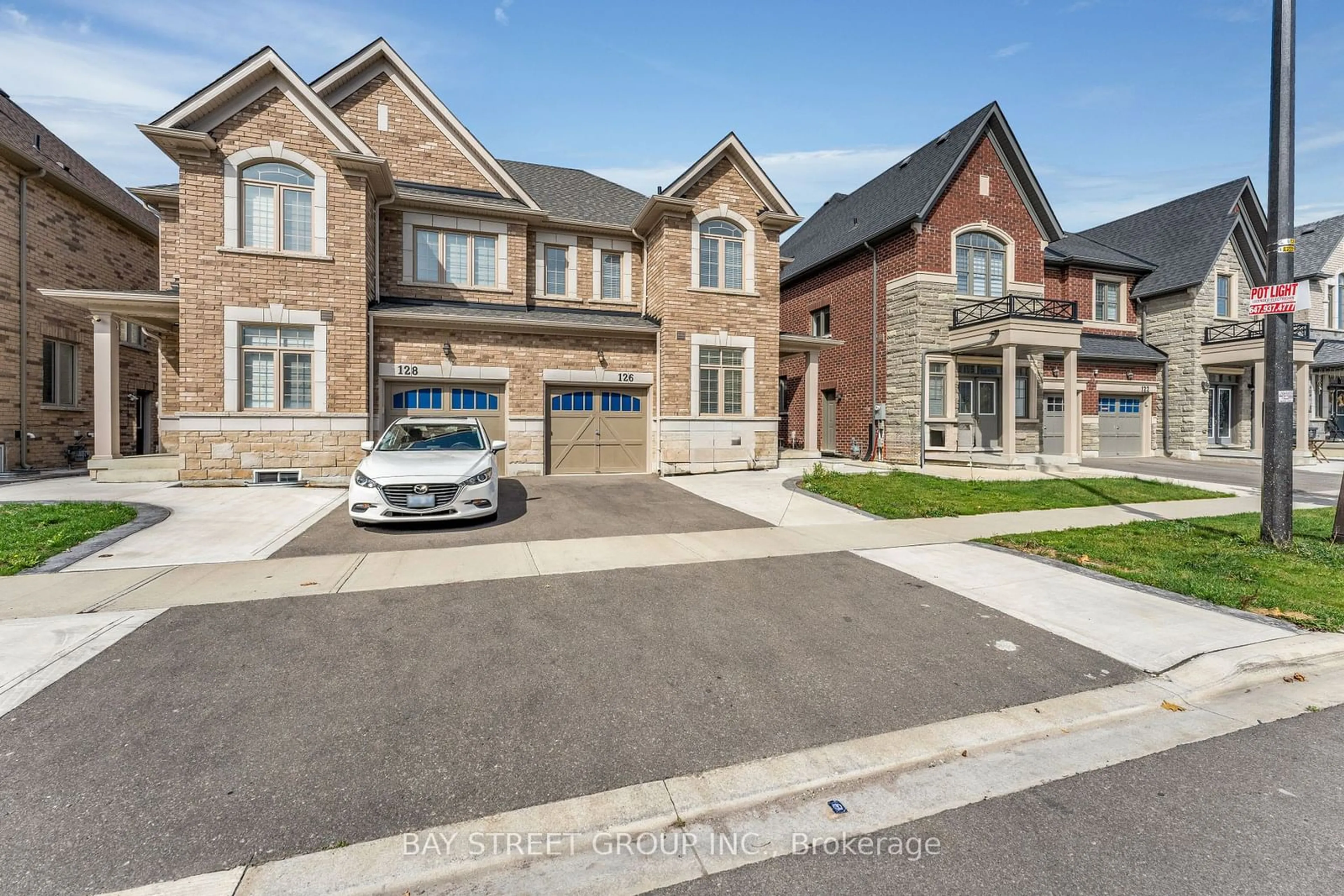 Home with brick exterior material, street for 126 Dolobram Tr, Brampton Ontario L7A 4Y5