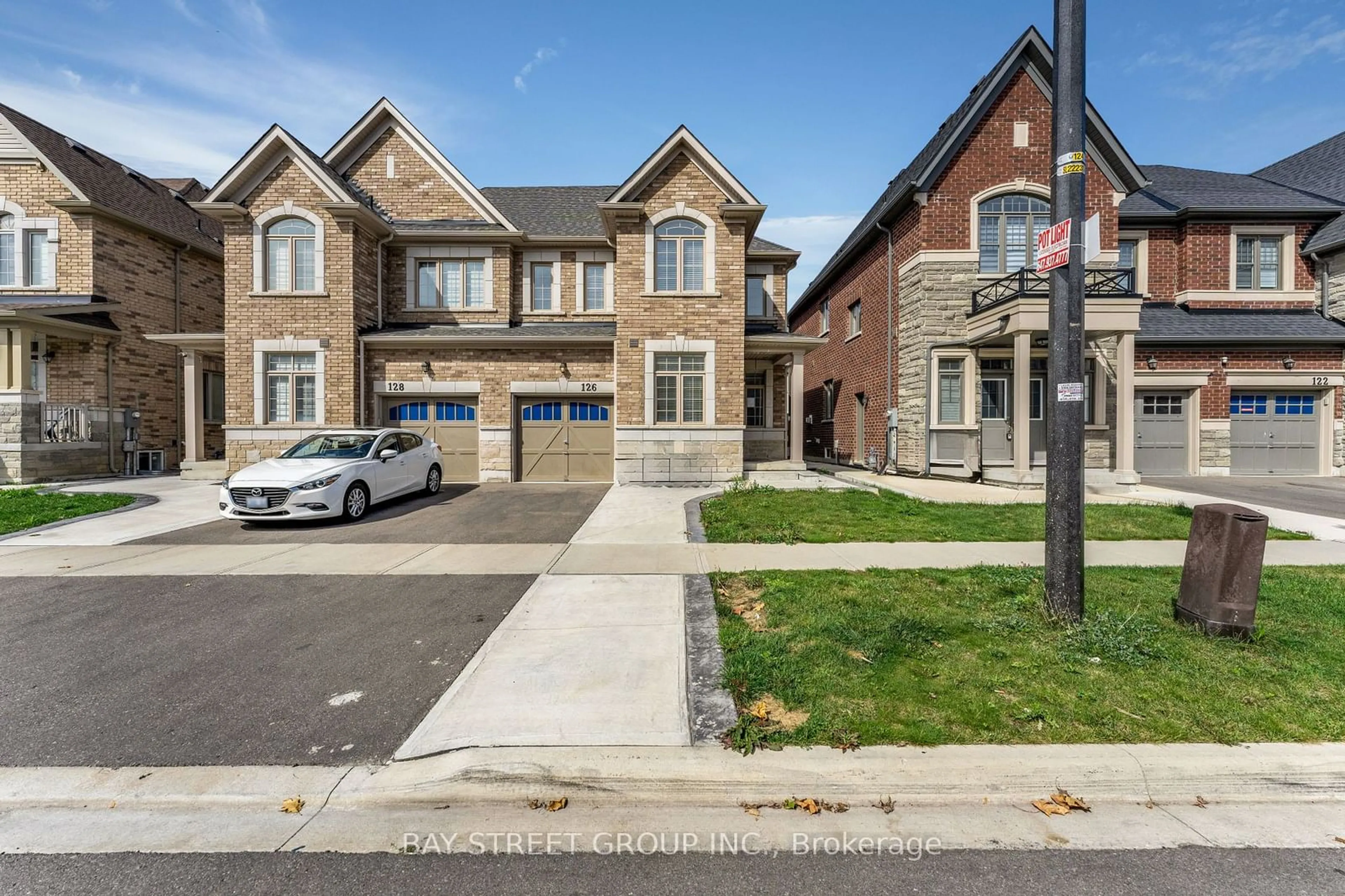 Home with brick exterior material, street for 126 Dolobram Tr, Brampton Ontario L7A 4Y5