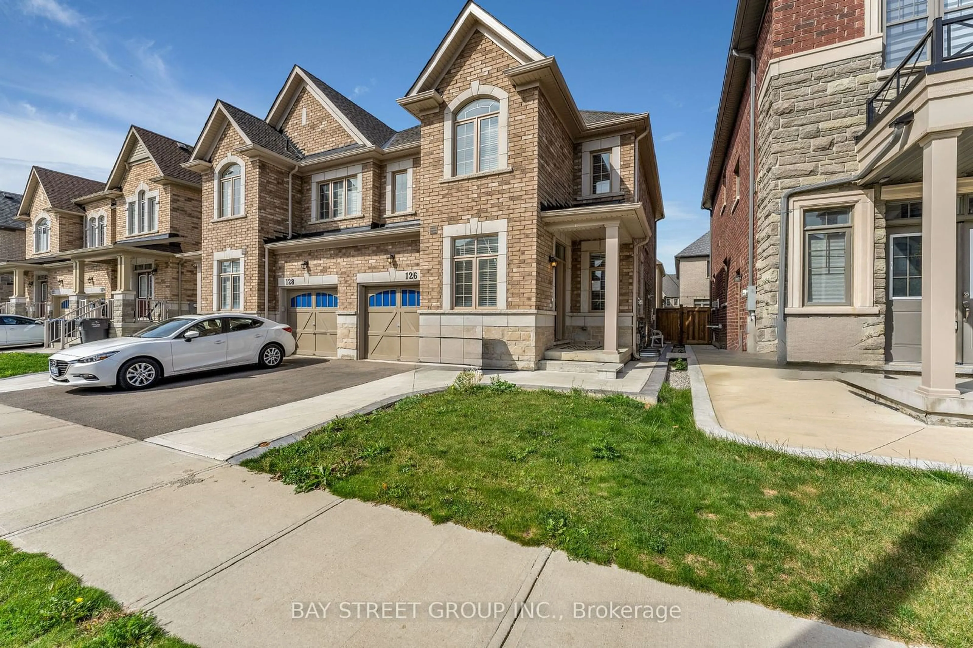 Home with brick exterior material, street for 126 Dolobram Tr, Brampton Ontario L7A 4Y5