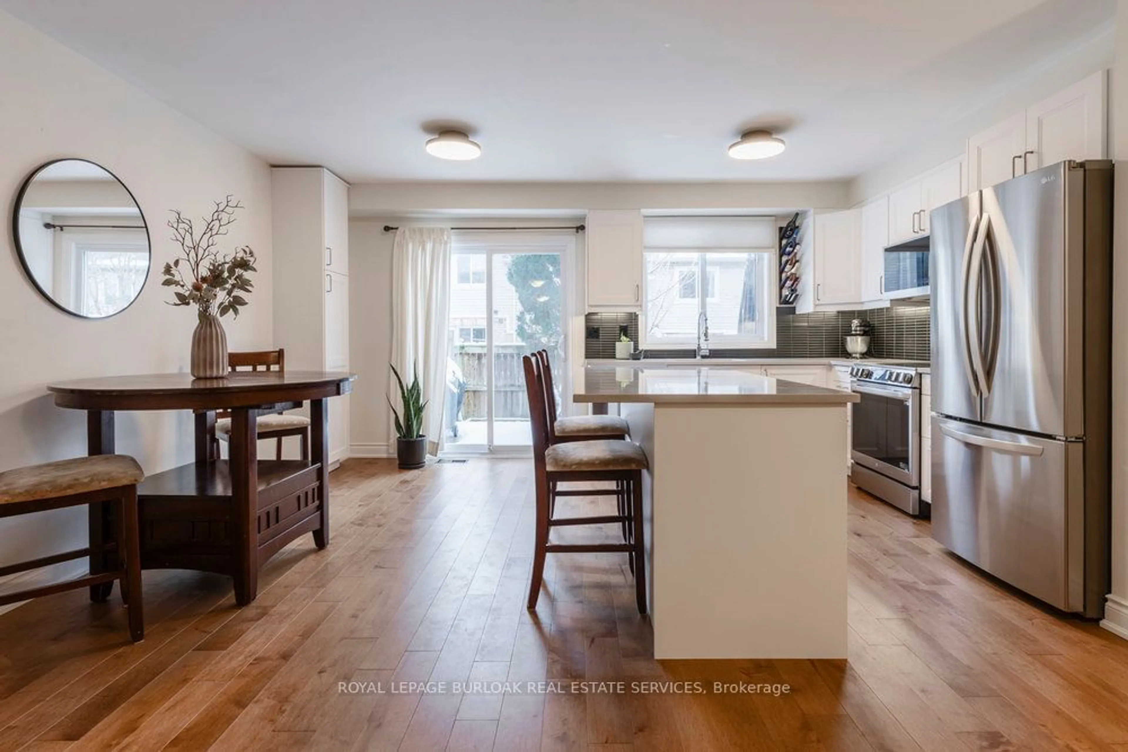 Open concept kitchen, wood/laminate floor for 710 Spring Gardens Rd #46, Burlington Ontario L7T 4K7