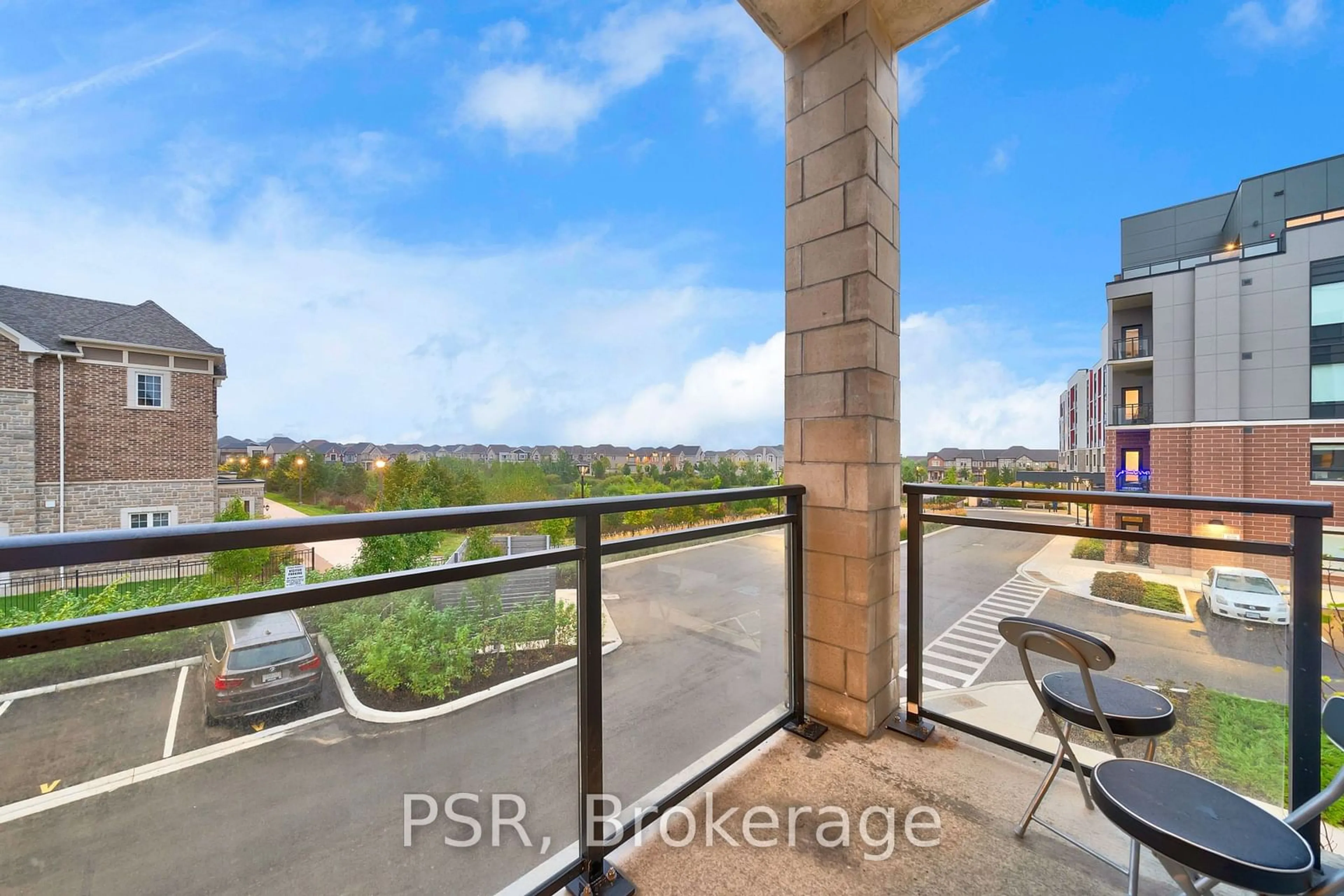 Patio, city buildings view from balcony for 3285 Carding Mill Tr #202, Oakville Ontario L6M 0X3