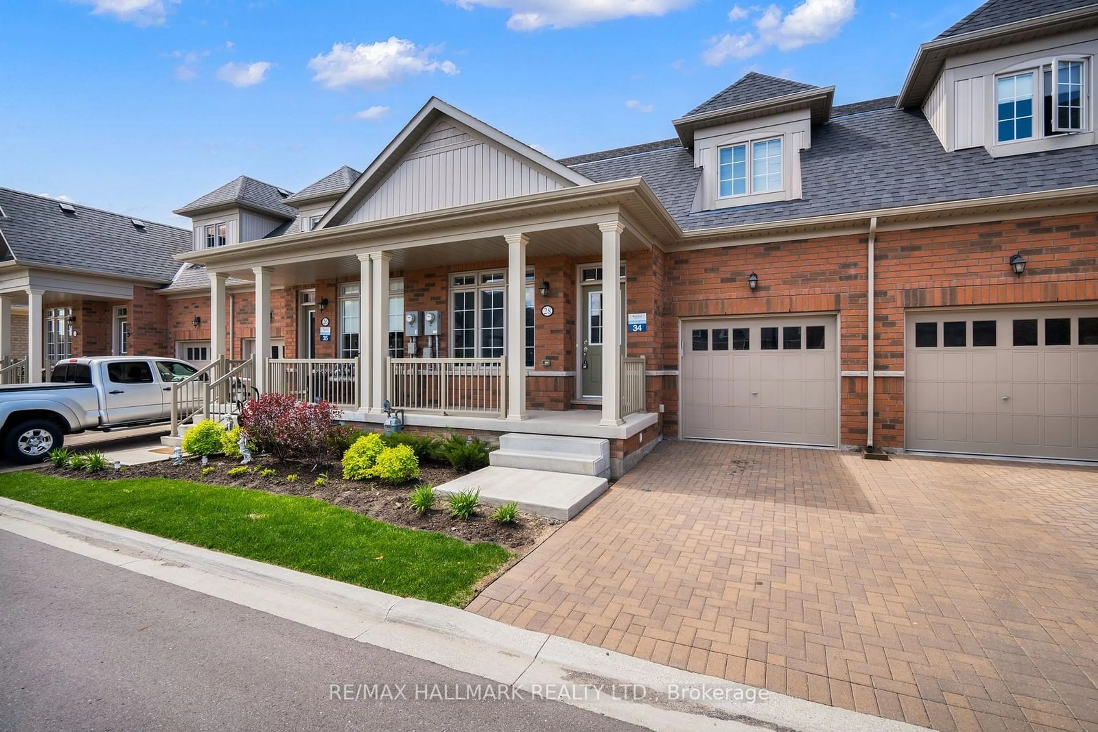 Home with brick exterior material, street for 28 Bluestone Cres, Brampton Ontario L6R 4B8