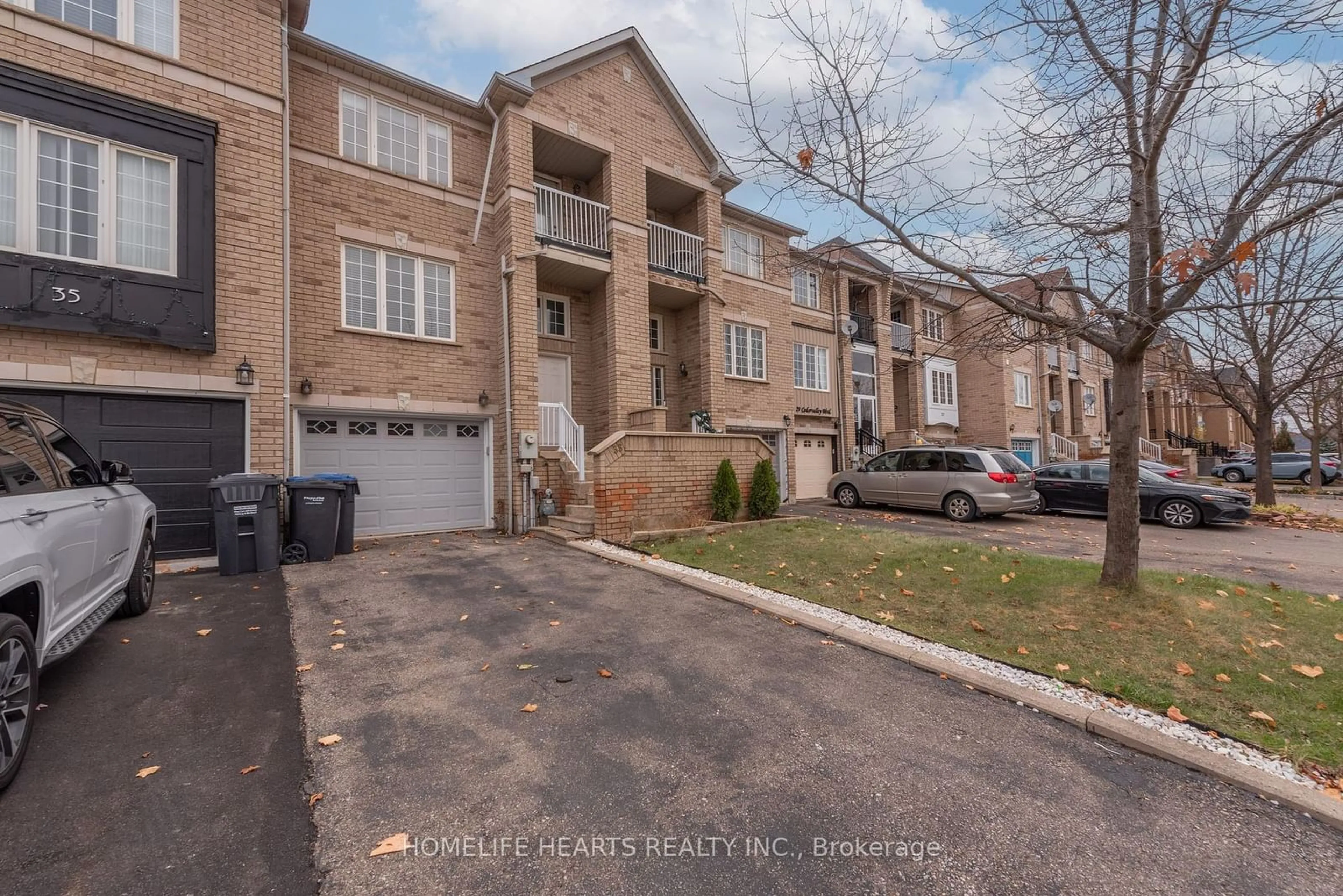 A pic from outside/outdoor area/front of a property/back of a property/a pic from drone, street for 33 Cedarvalley Blvd, Brampton Ontario L7A 2C2