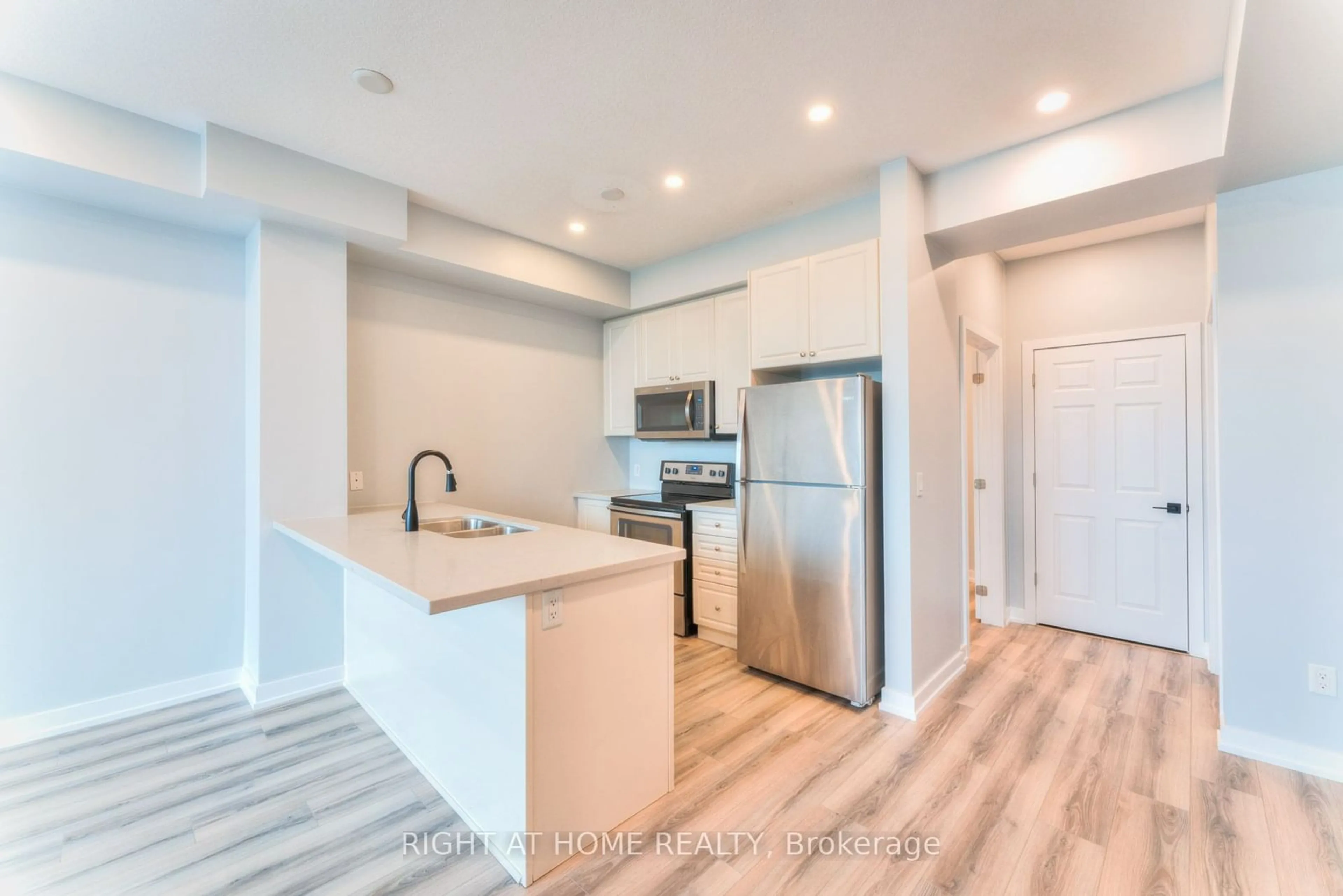 Open concept kitchen, unknown for 2486 Old Bronte Rd #320, Oakville Ontario L6M 0Y4