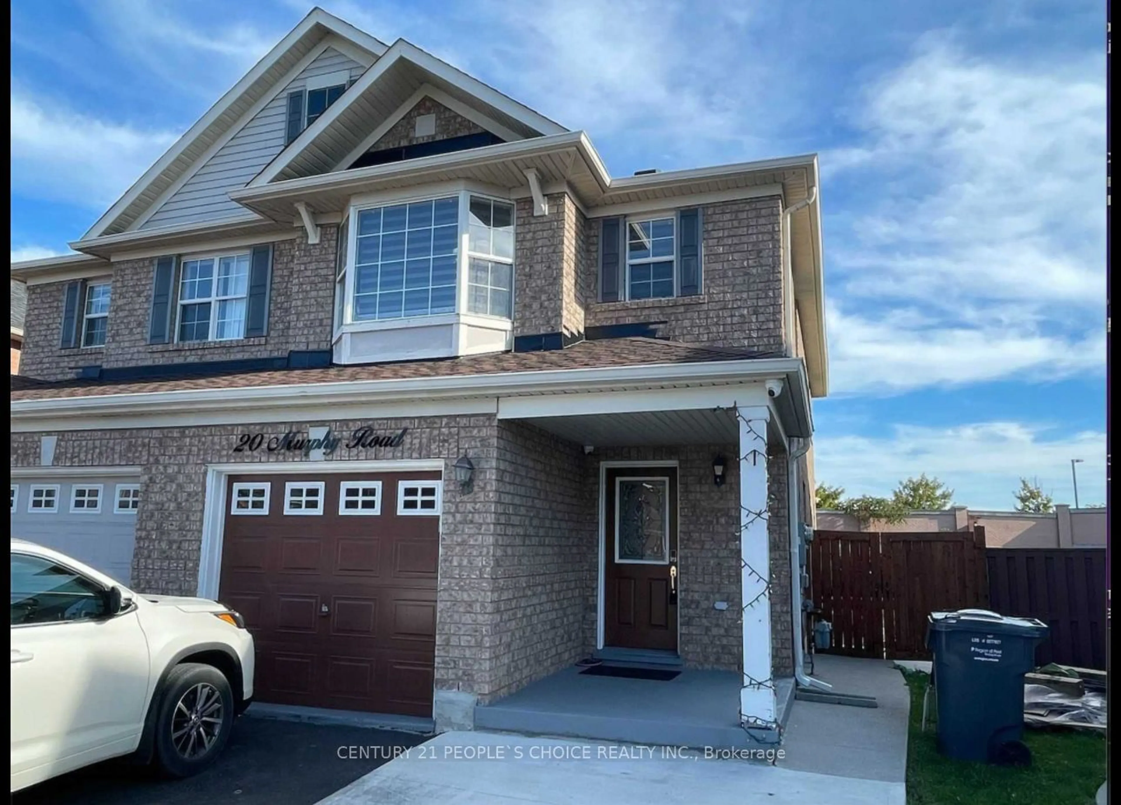 Home with brick exterior material, street for 20 Murphy Rd, Brampton Ontario L6S 6L2