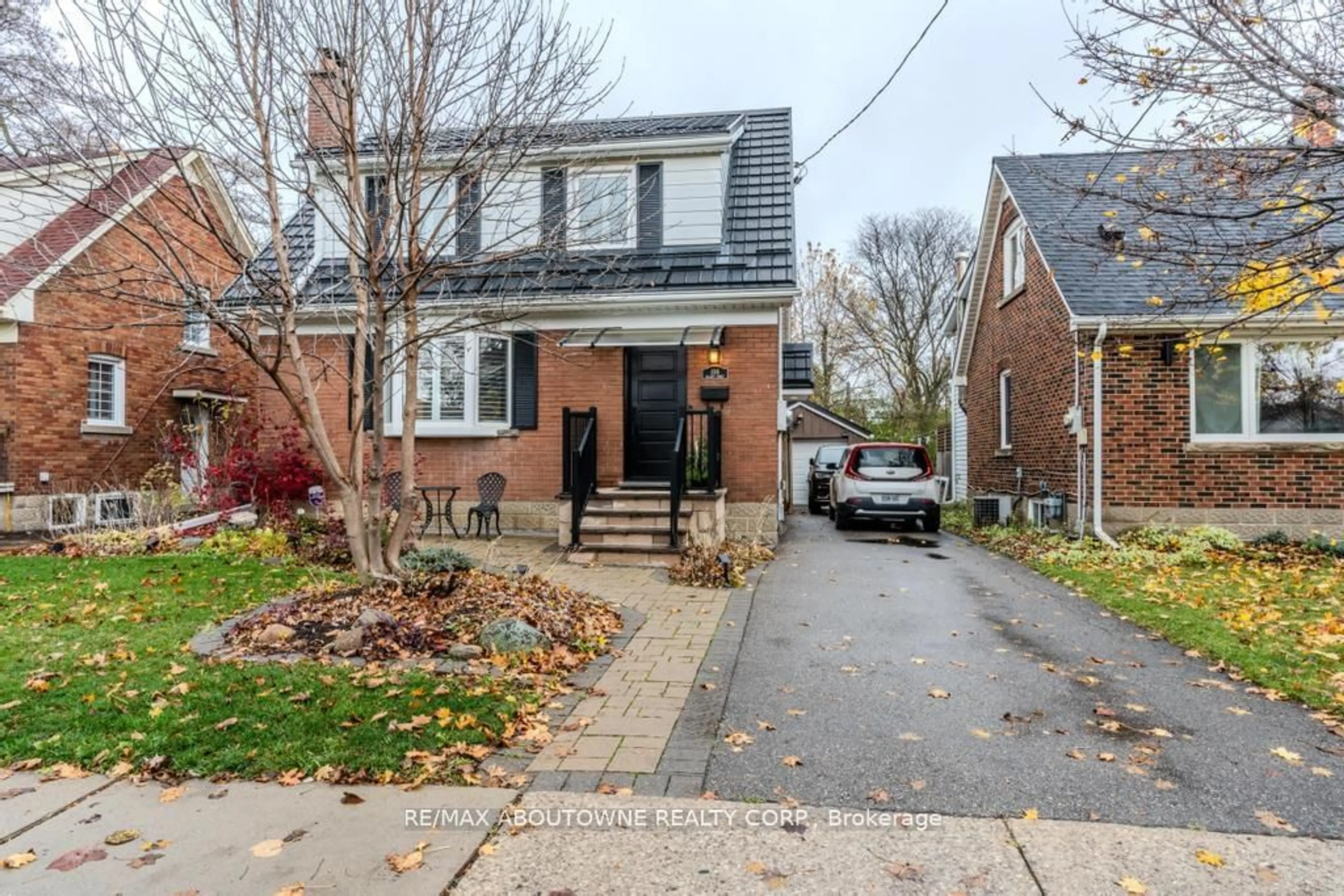 Home with brick exterior material, street for 106 ELLIOTT St, Brampton Ontario L6Y 1W4