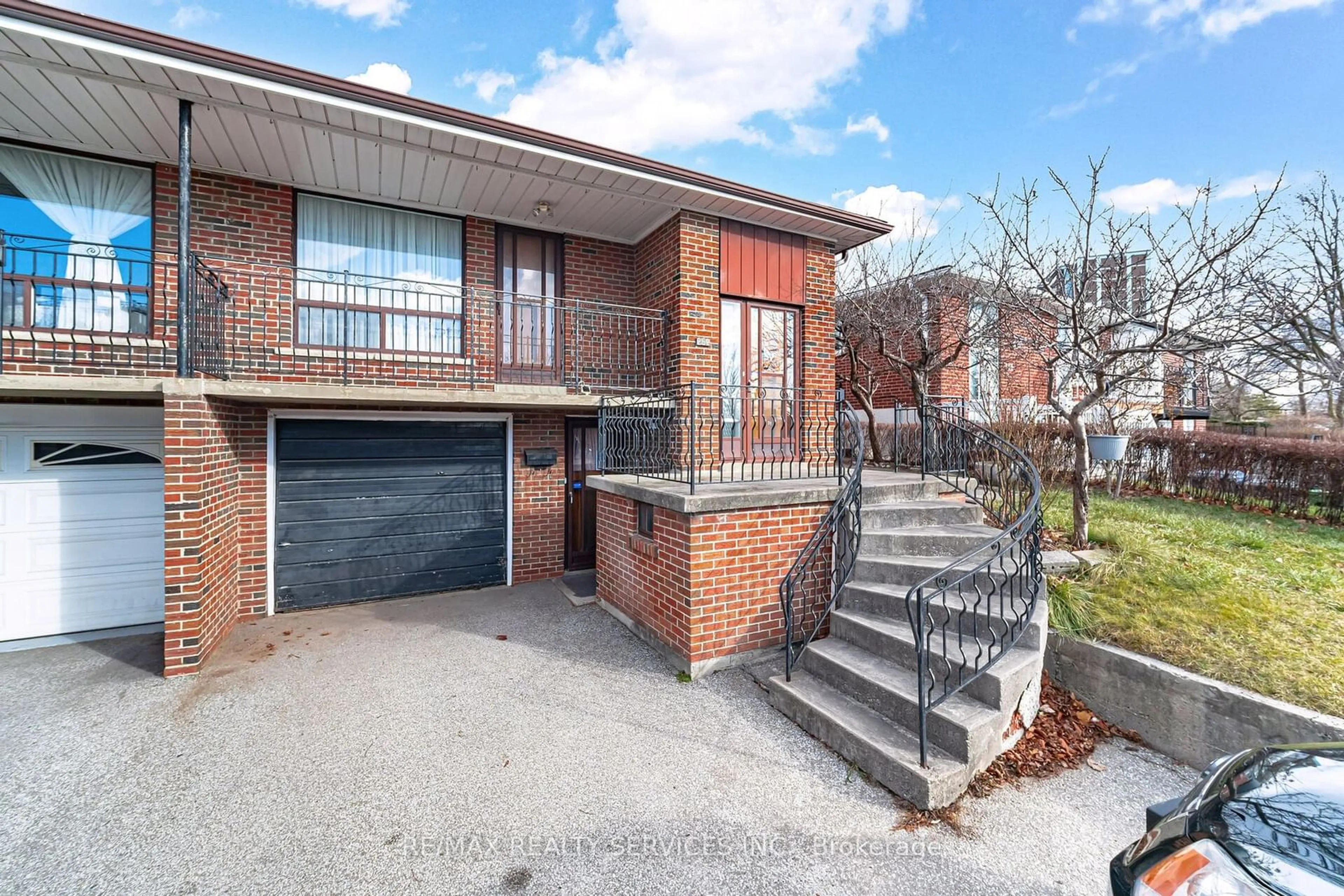 Home with brick exterior material, street for 252 Grandravine Dr, Toronto Ontario M3N 1J3