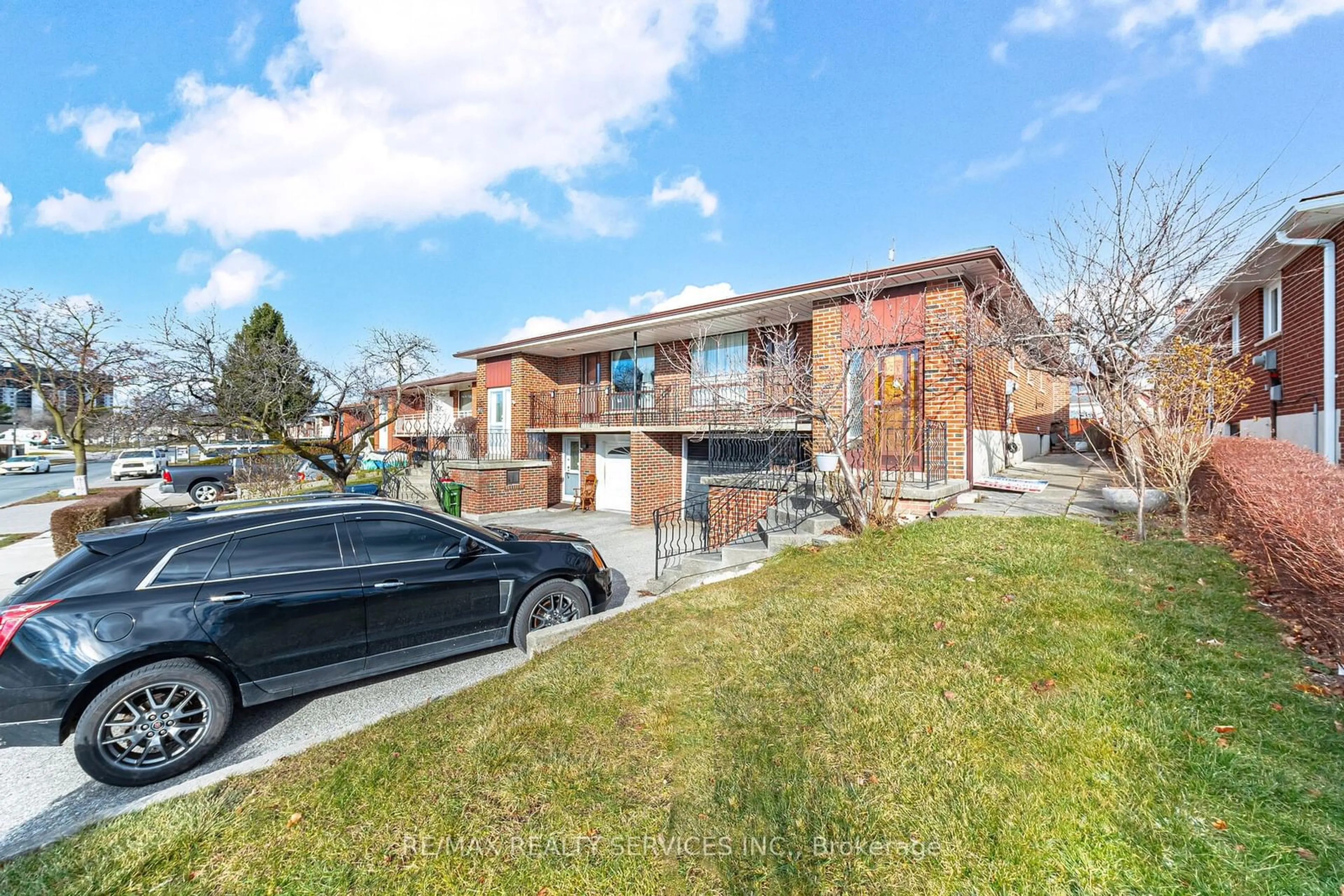 Home with brick exterior material, street for 252 Grandravine Dr, Toronto Ontario M3N 1J3