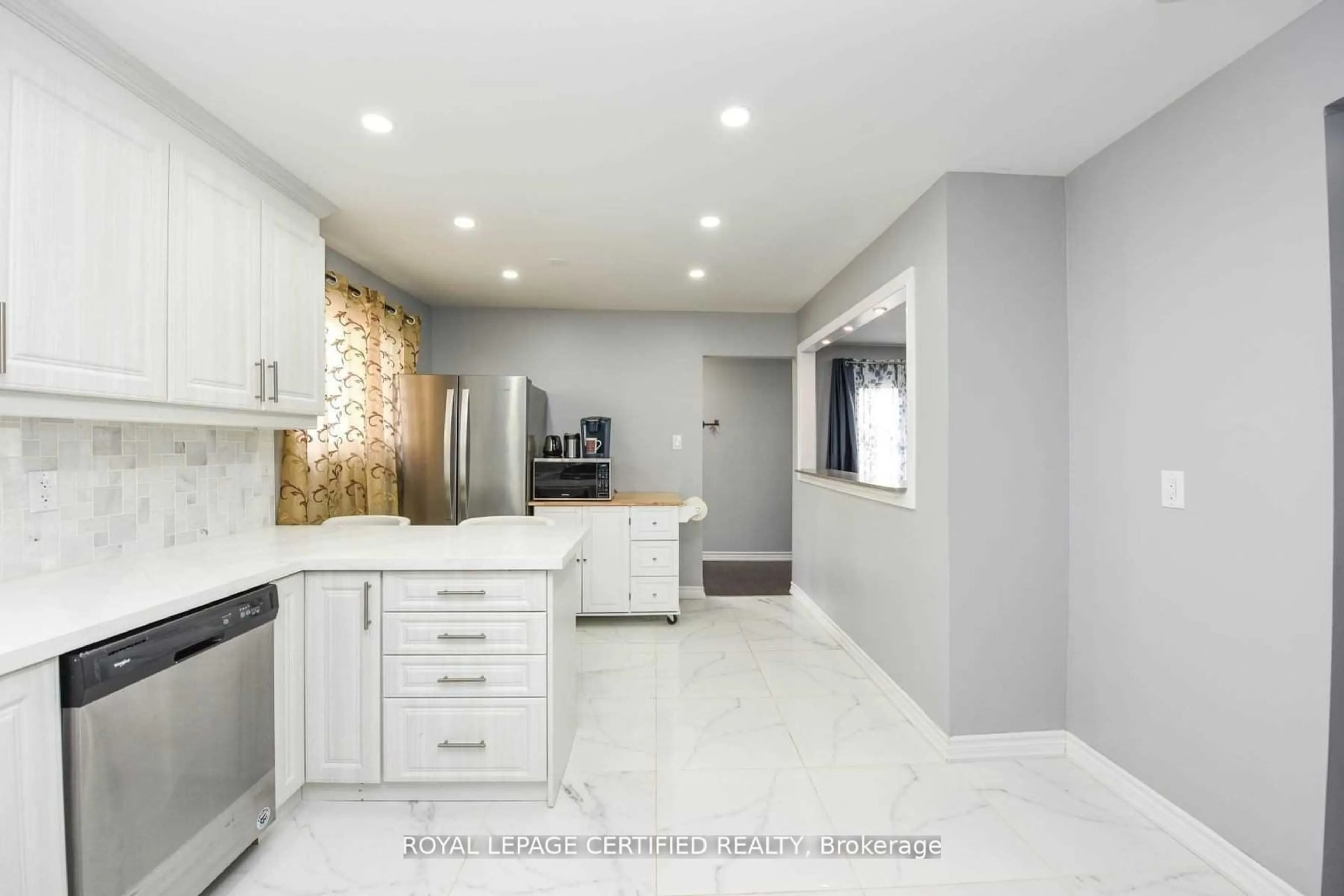 Contemporary kitchen, ceramic/tile floor for 87 Newlyn Cres, Brampton Ontario L6V 3A9