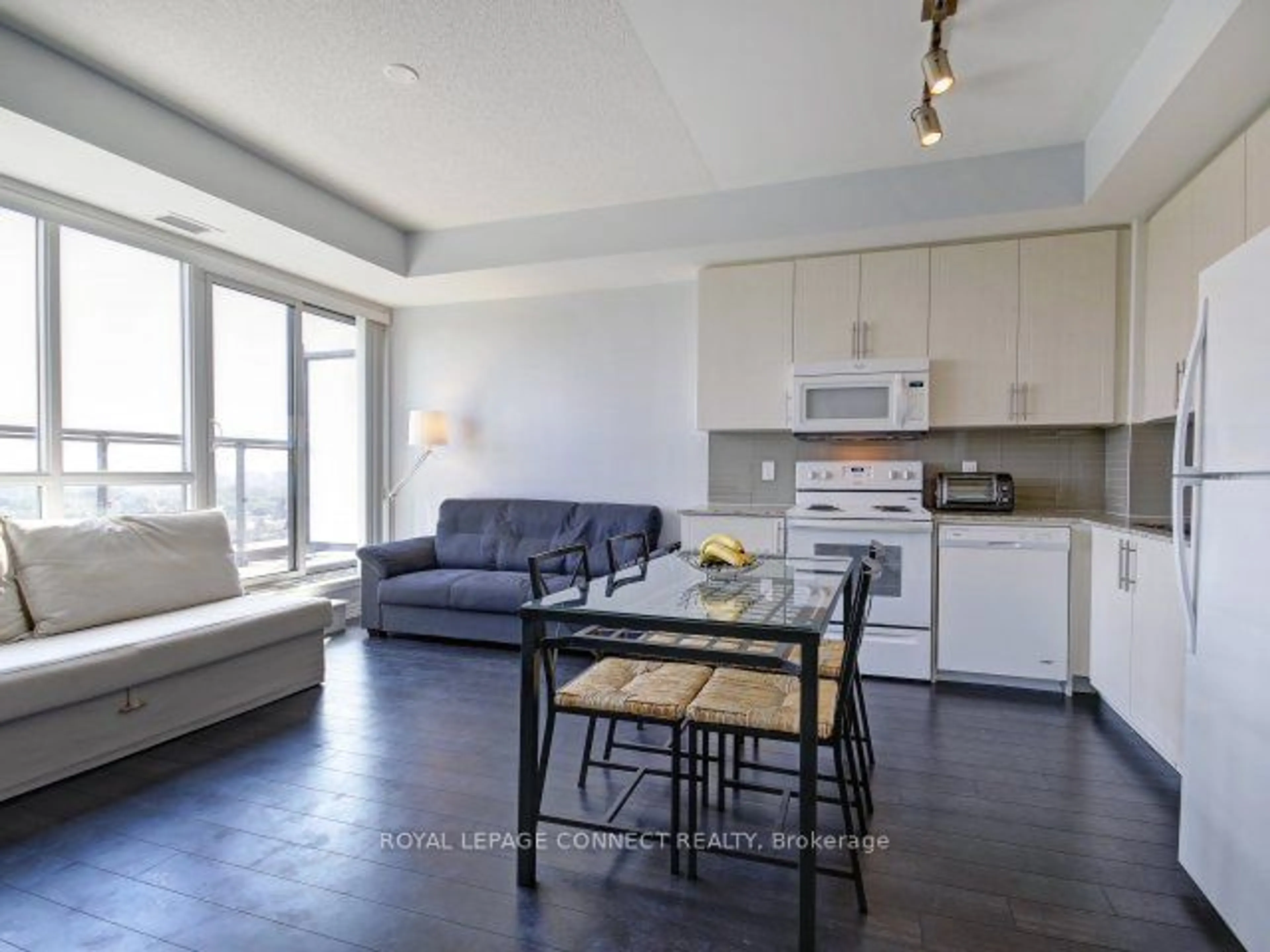 Open concept kitchen, wood/laminate floor for 80 Esther Lorrie Dr #1207, Toronto Ontario M9W 0C6