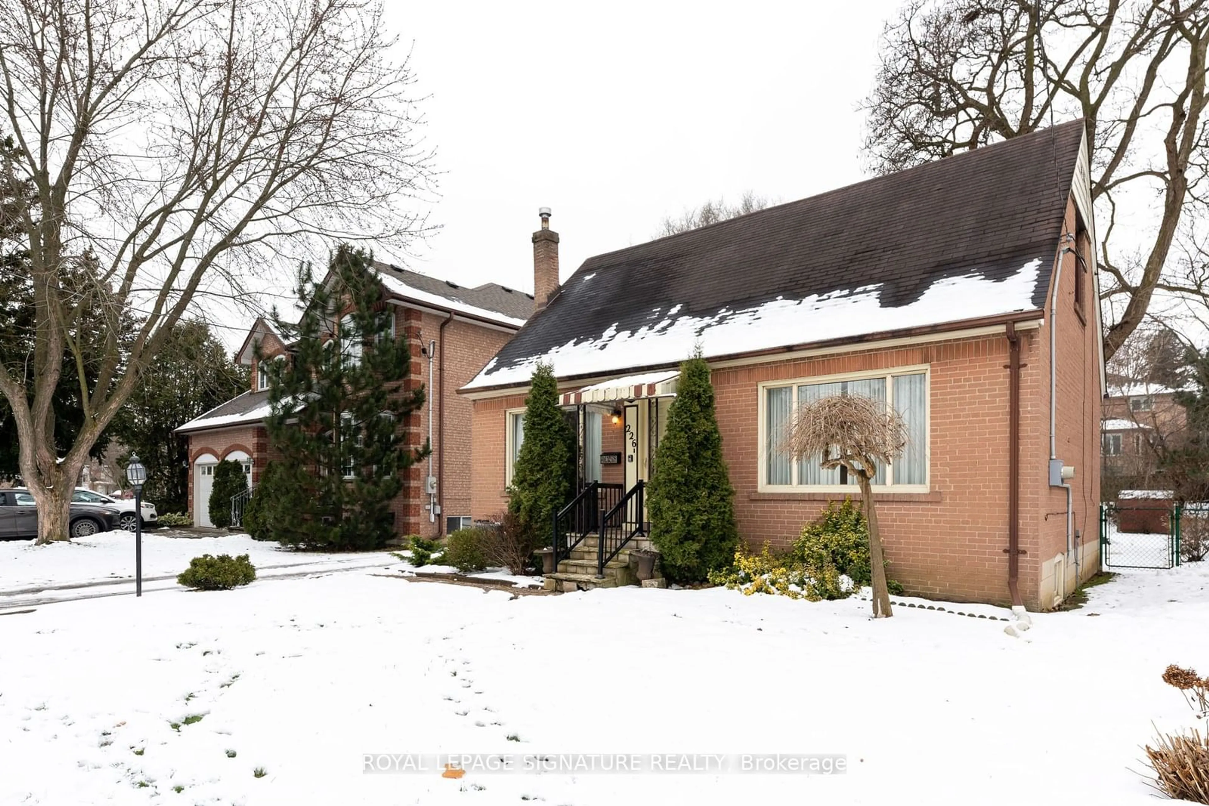 Home with brick exterior material, street for 226 Martin Grove Rd, Toronto Ontario M9B 4L4