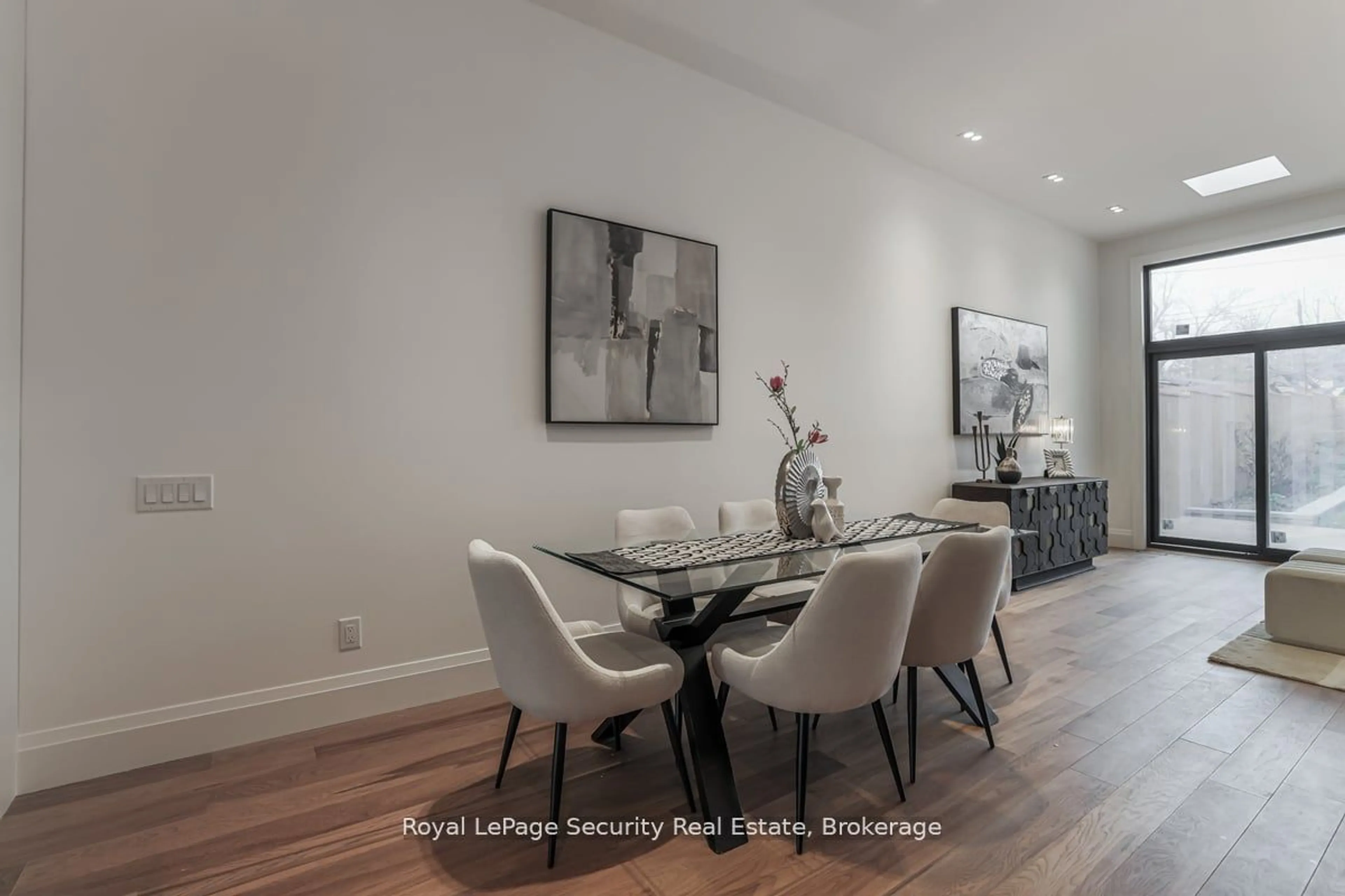 Dining room, wood/laminate floor for 604 Ridelle Ave, Toronto Ontario M6B 1K9