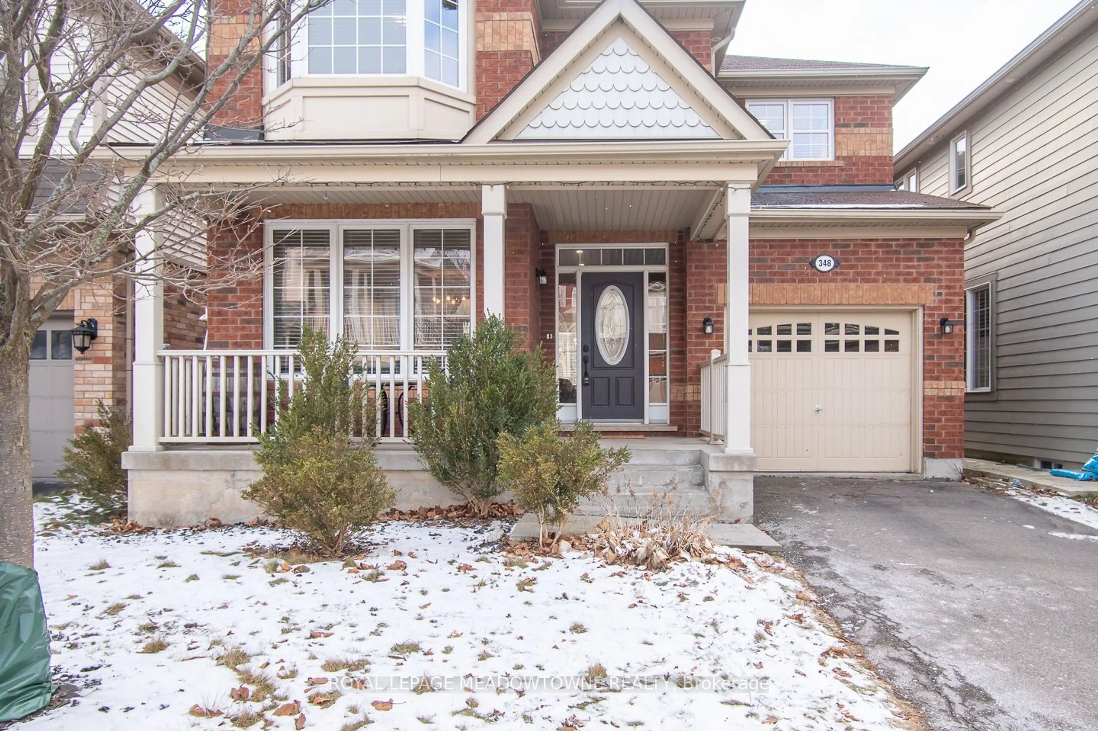 Home with brick exterior material, street for 348 Tonelli Lane, Milton Ontario L9T 0N4