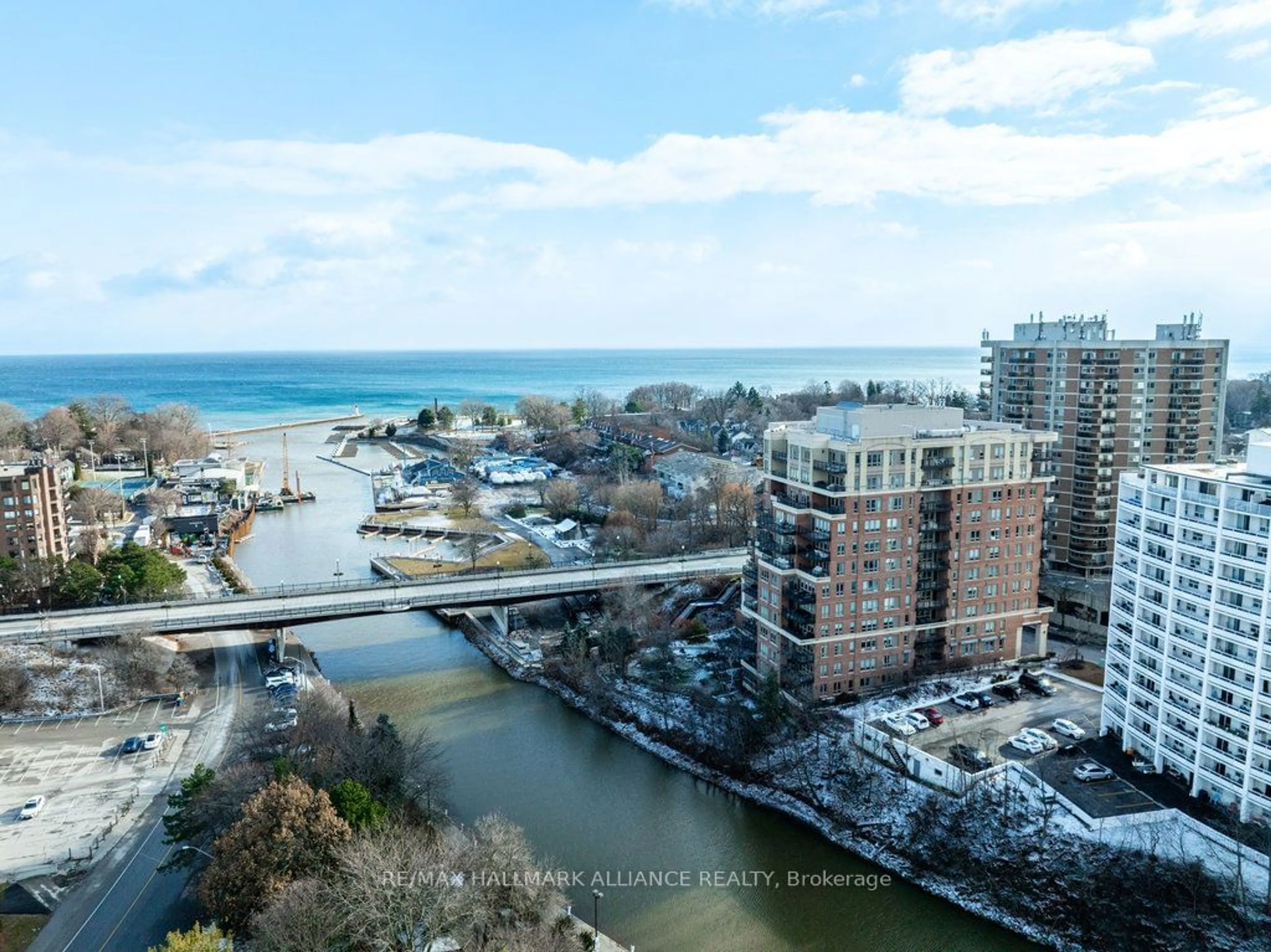 A pic from outside/outdoor area/front of a property/back of a property/a pic from drone, water/lake/river/ocean view for 111 Forsythe St #201, Oakville Ontario L6K 3J9