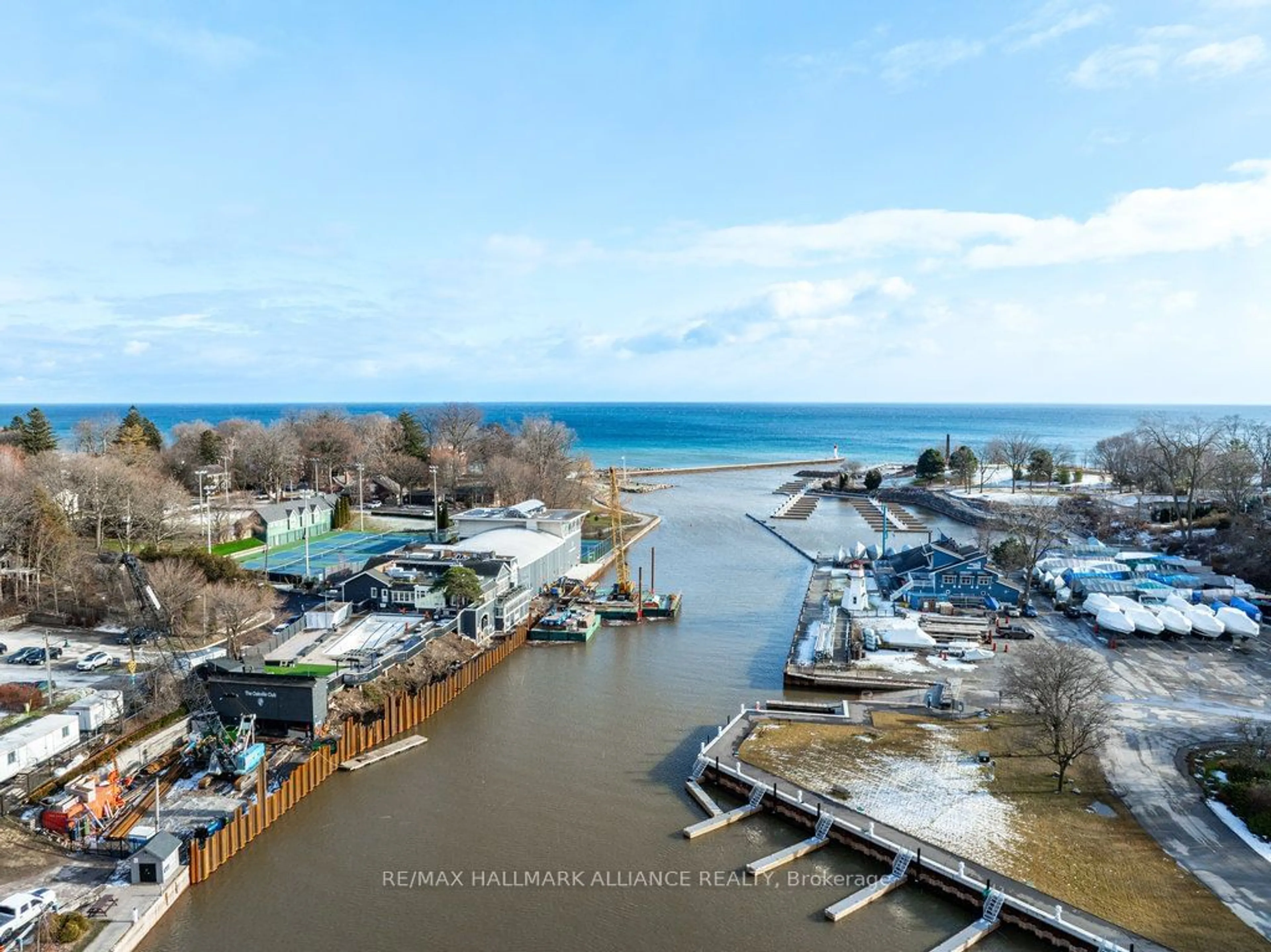 A pic from outside/outdoor area/front of a property/back of a property/a pic from drone, water/lake/river/ocean view for 111 Forsythe St #201, Oakville Ontario L6K 3J9