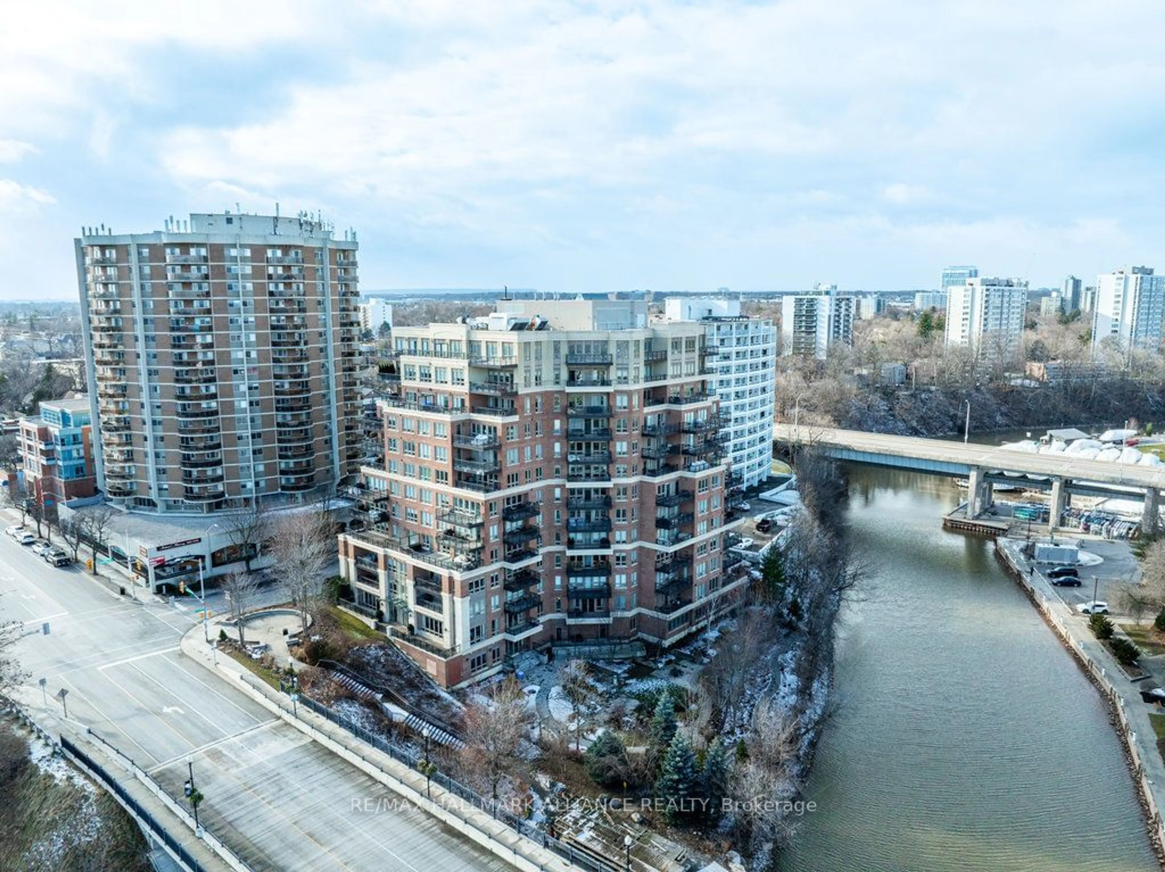 A pic from outside/outdoor area/front of a property/back of a property/a pic from drone, city buildings view from balcony for 111 Forsythe St #201, Oakville Ontario L6K 3J9