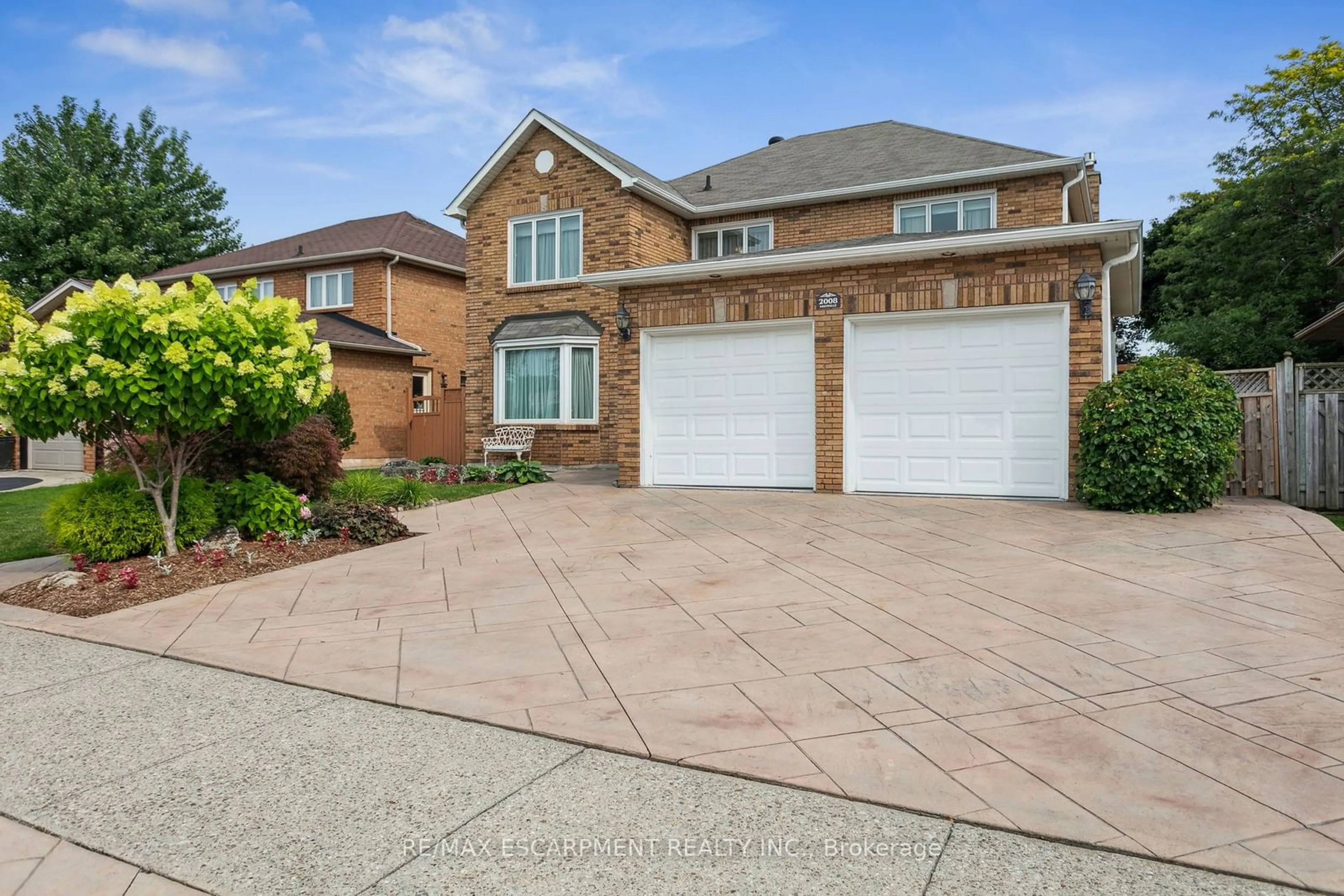 Home with brick exterior material, street for 2008 Grenville Dr, Oakville Ontario L6H 3Z3