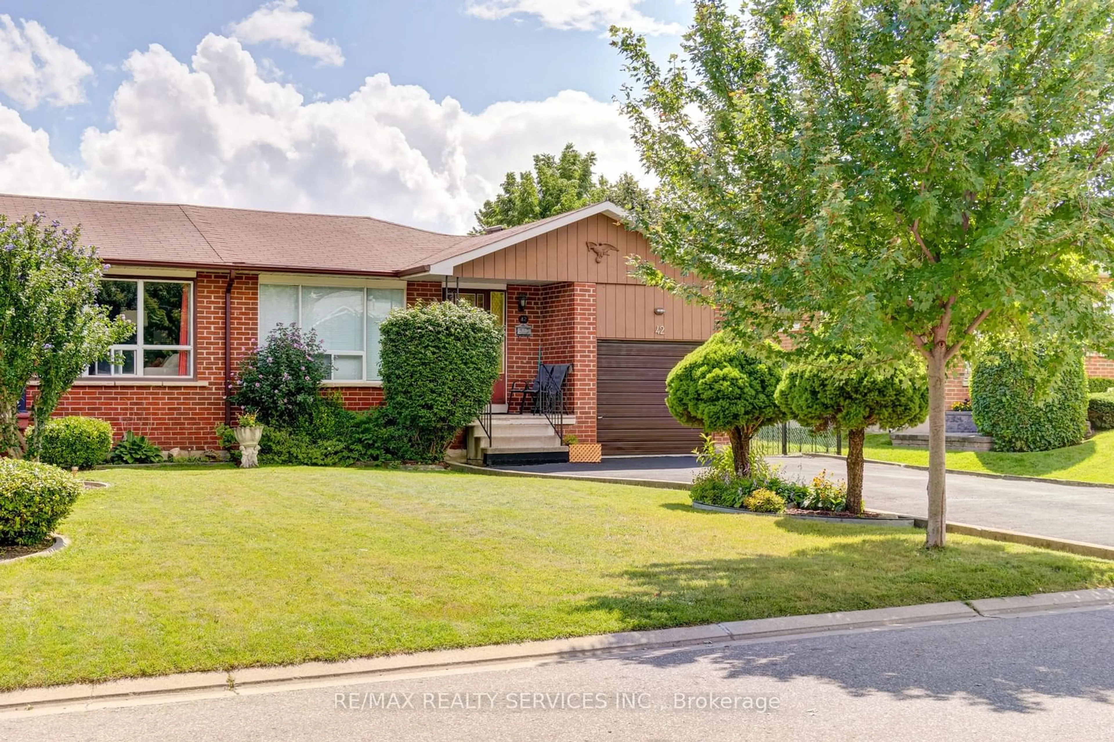 Home with brick exterior material, street for 42 Mallard Cres, Brampton Ontario L6S 2T6