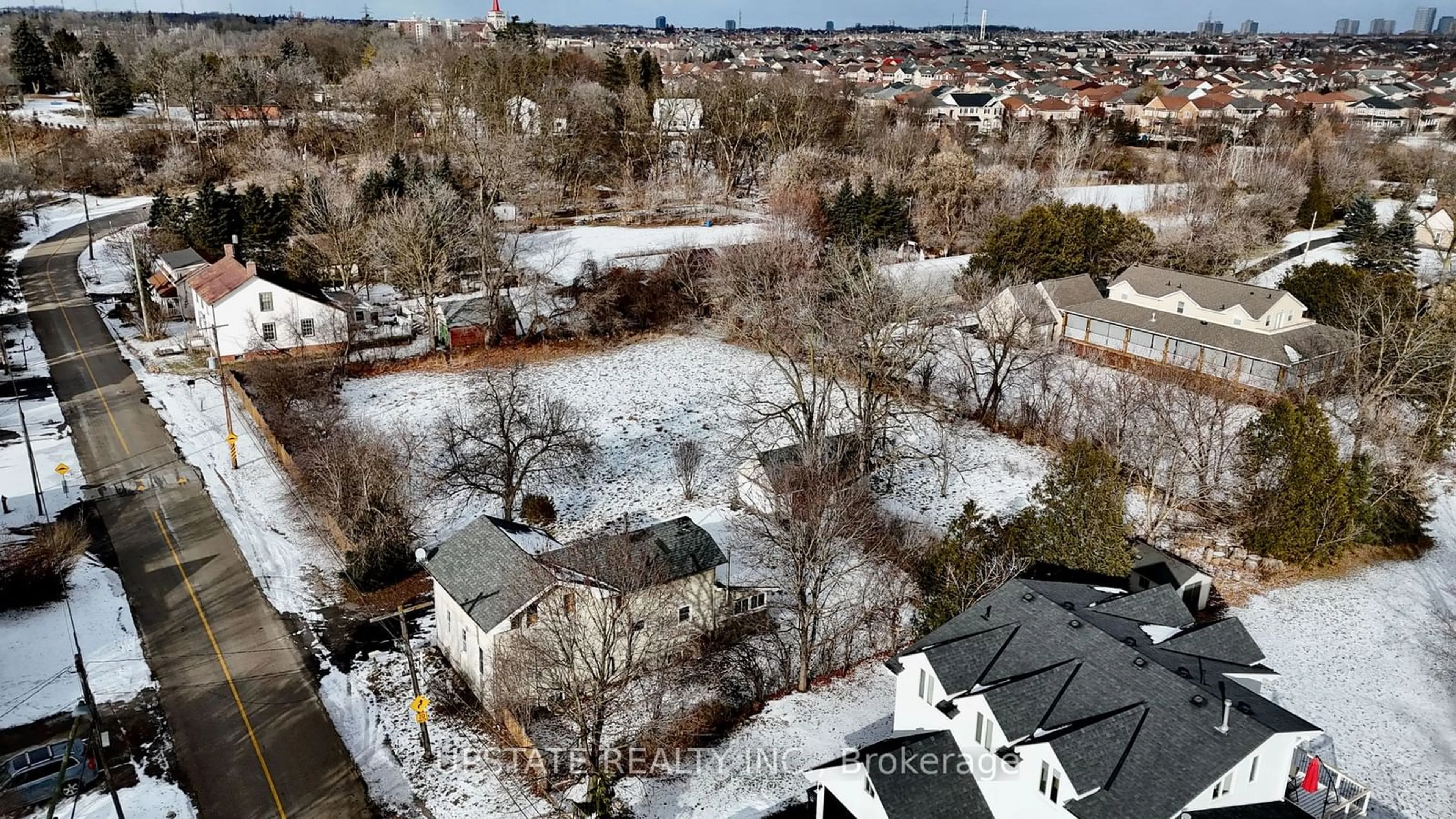 A pic from outside/outdoor area/front of a property/back of a property/a pic from drone, city buildings view from balcony for 7749 Churchville Rd, Brampton Ontario L6Y 0H3