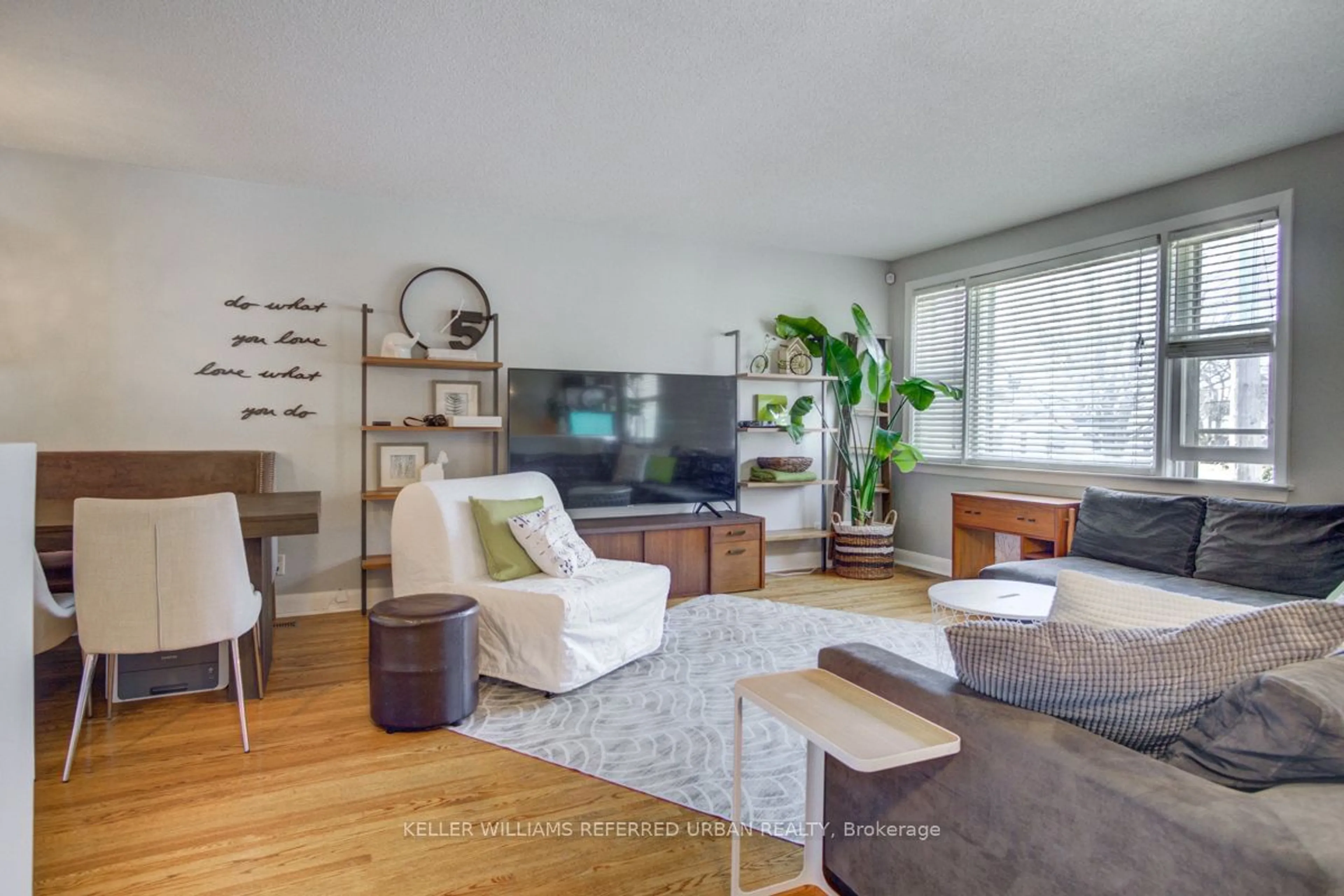 Living room with furniture, wood/laminate floor for 63 Fortieth St, Toronto Ontario M8W 3M8