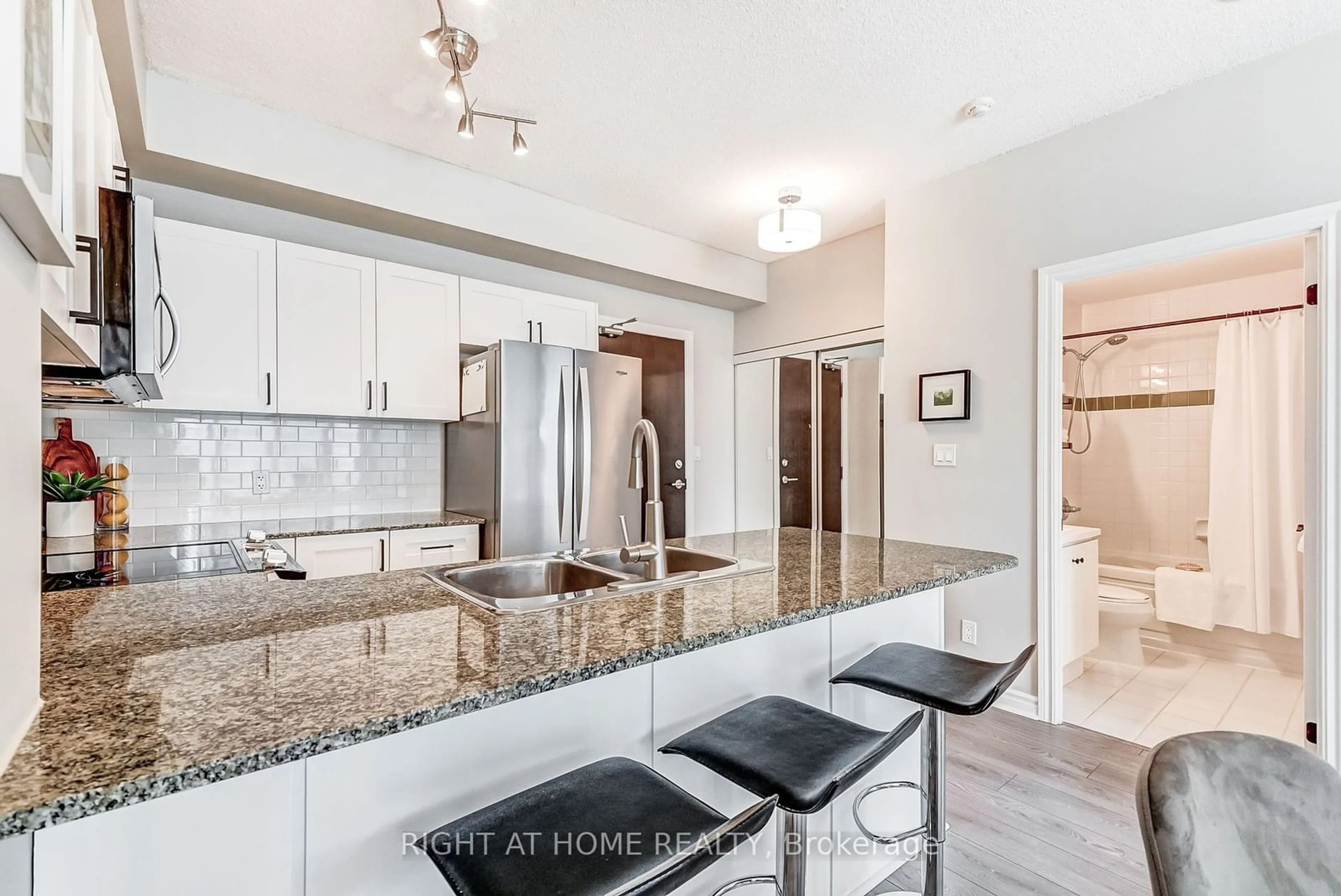 Open concept kitchen, ceramic/tile floor for 3504 Hurontario St #608, Mississauga Ontario L5B 0B9