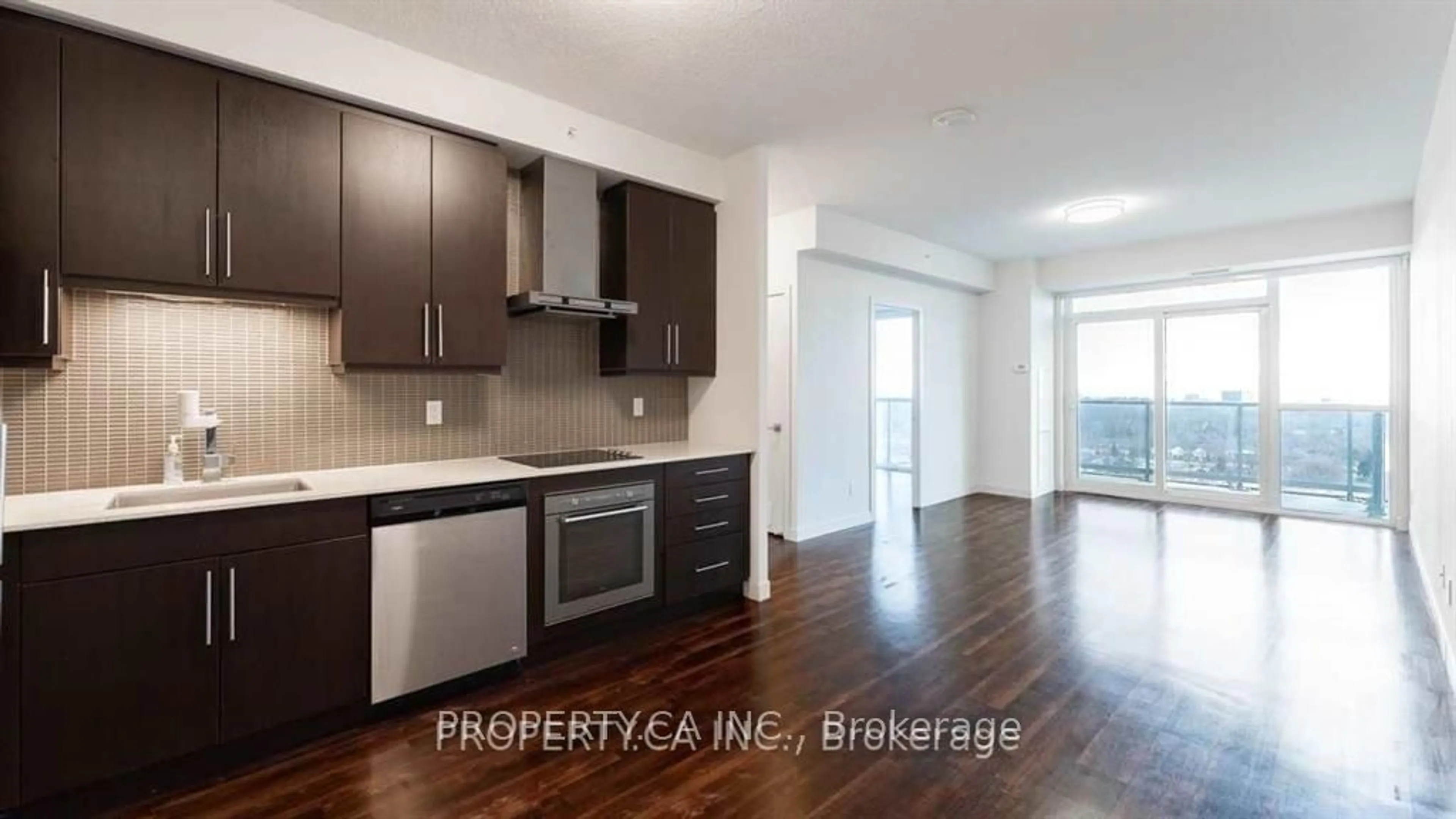 Open concept kitchen, wood/laminate floor for 2081 Fairview St #1603, Burlington Ontario L7R 0E4