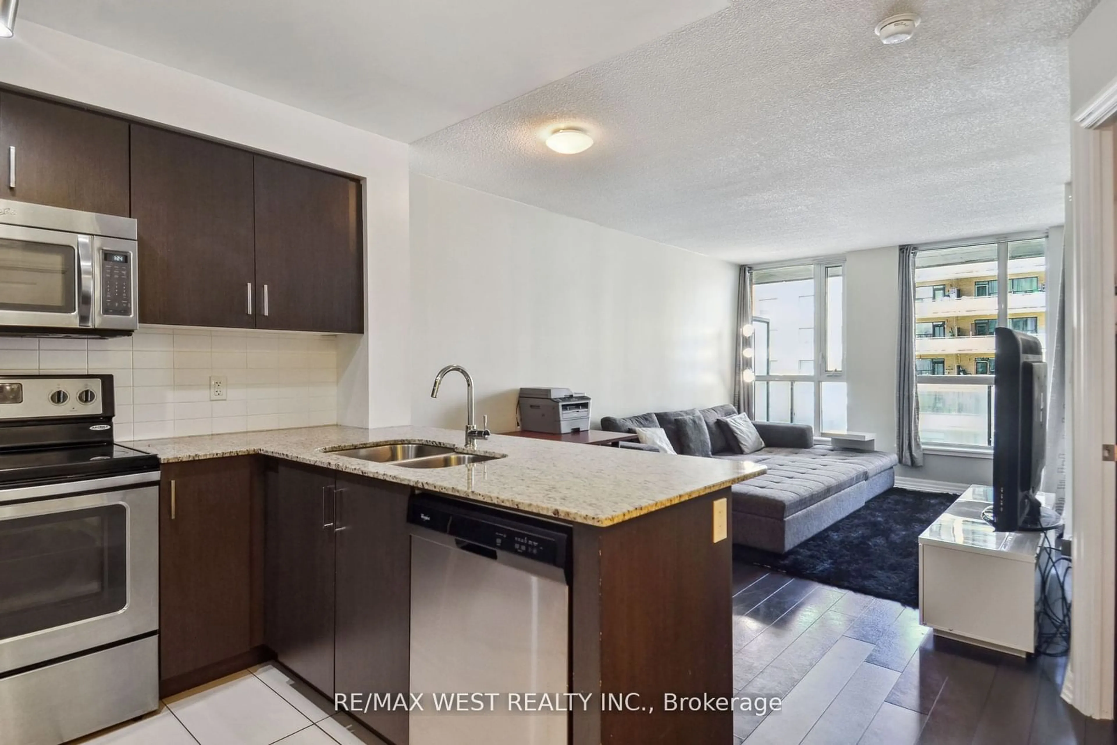 Open concept kitchen, unknown for 80 Esther Lorrie Dr #321, Toronto Ontario M9W 0C6