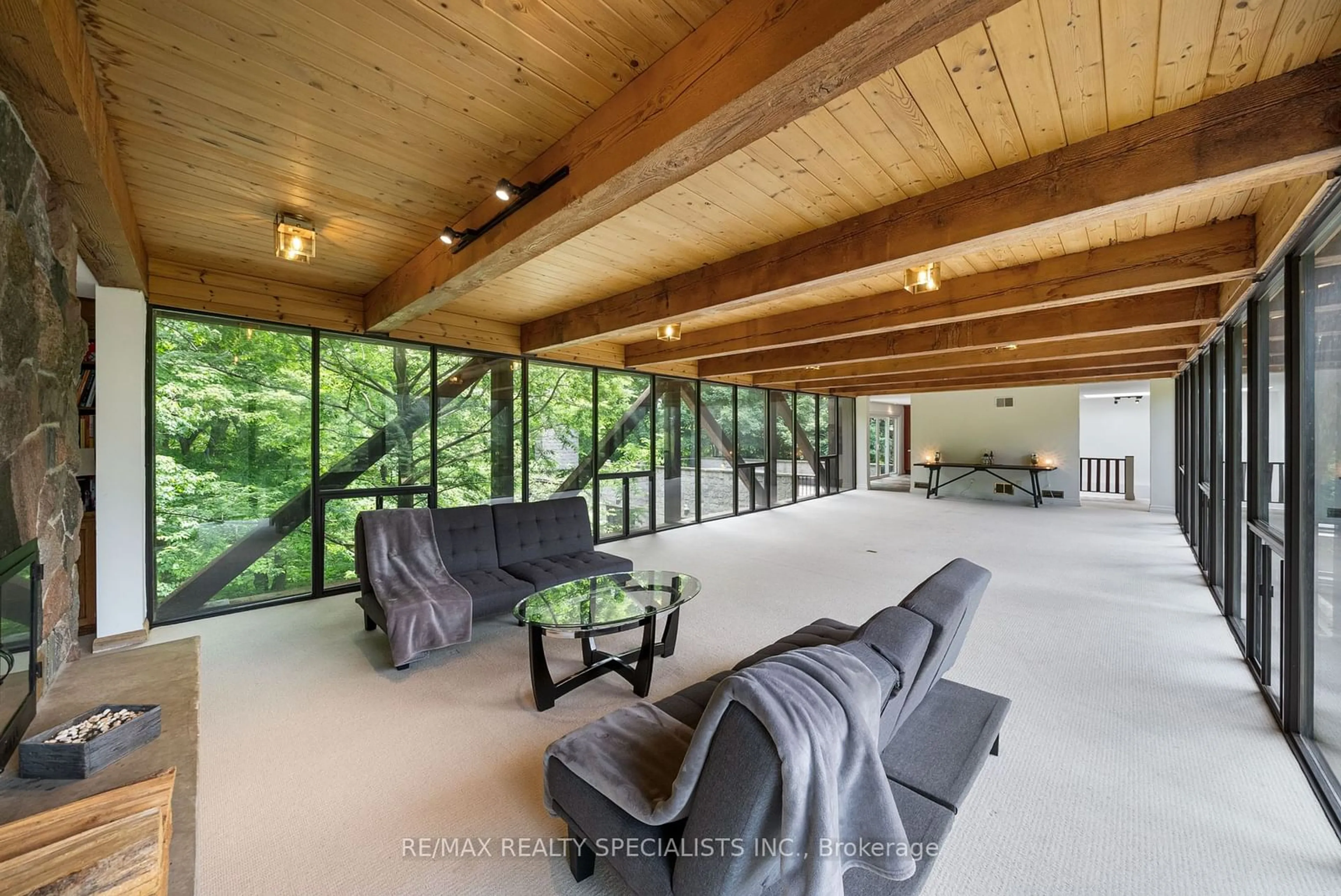 Living room with furniture, cement floor for 15139 Rockside Rd, Caledon Ontario L7C 1V4