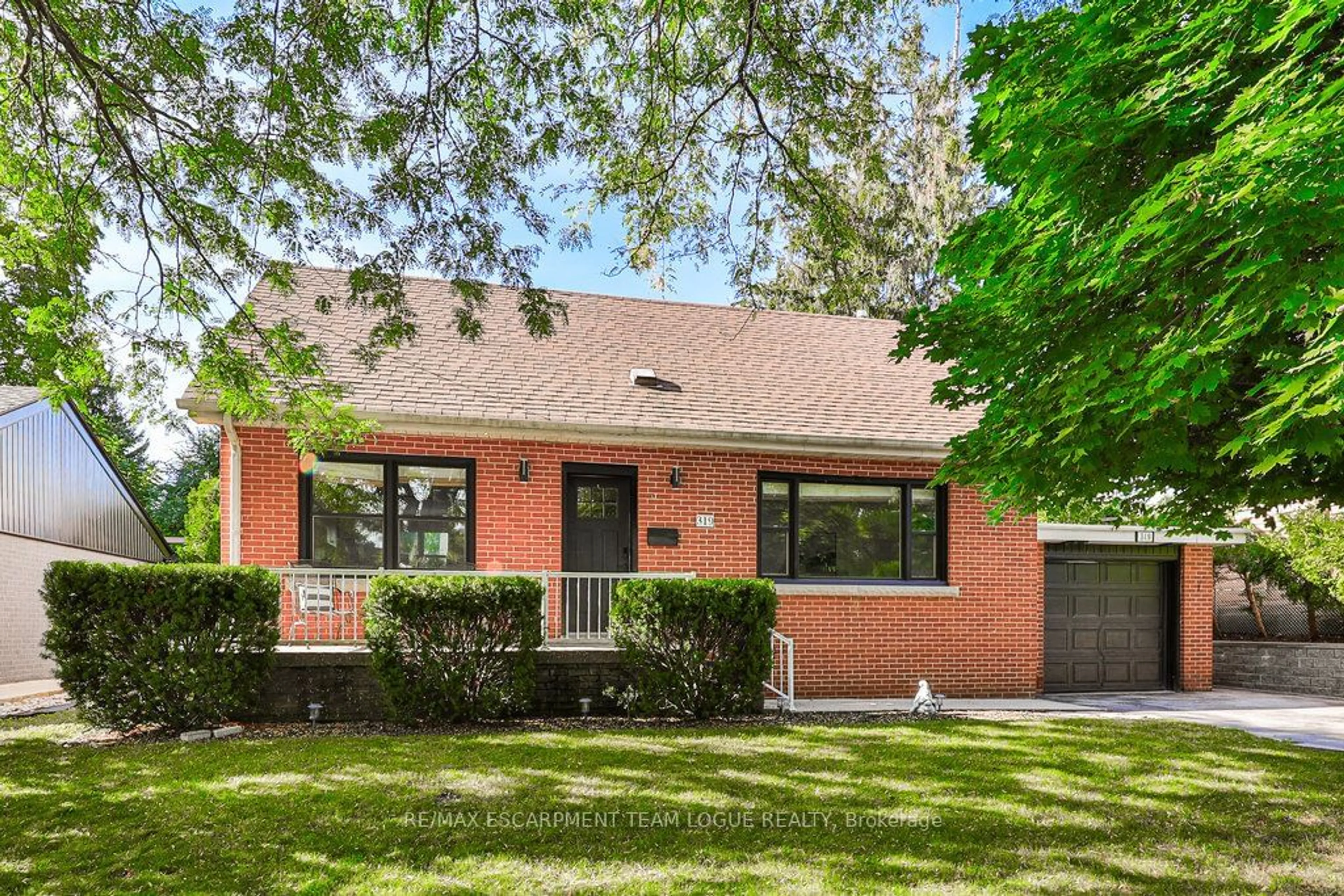 Home with brick exterior material, street for 319 Townsend Ave, Burlington Ontario L7T 2A2