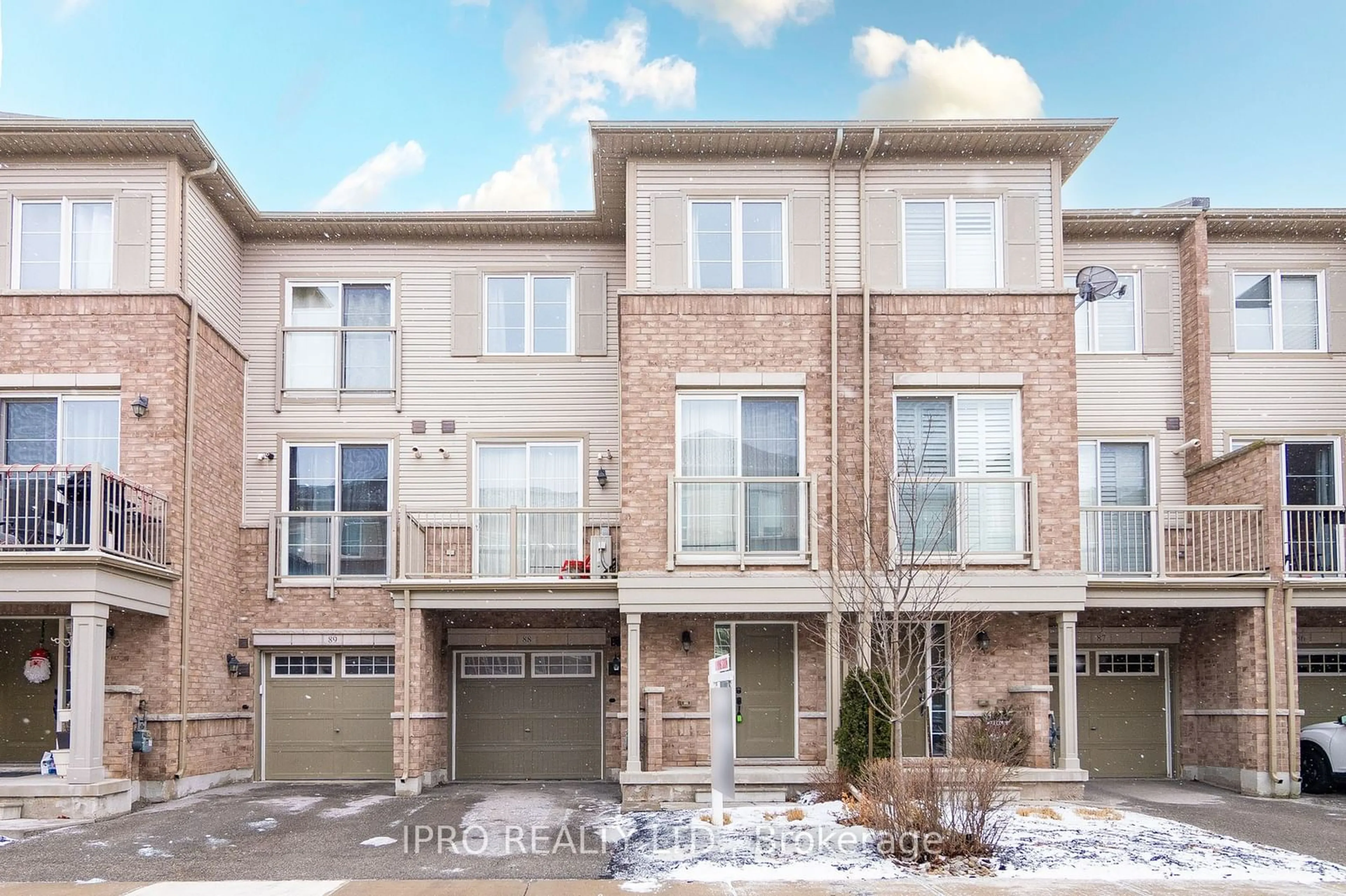 Home with brick exterior material, street for 165 Hampshire Way #88, Milton Ontario L9T 8M7