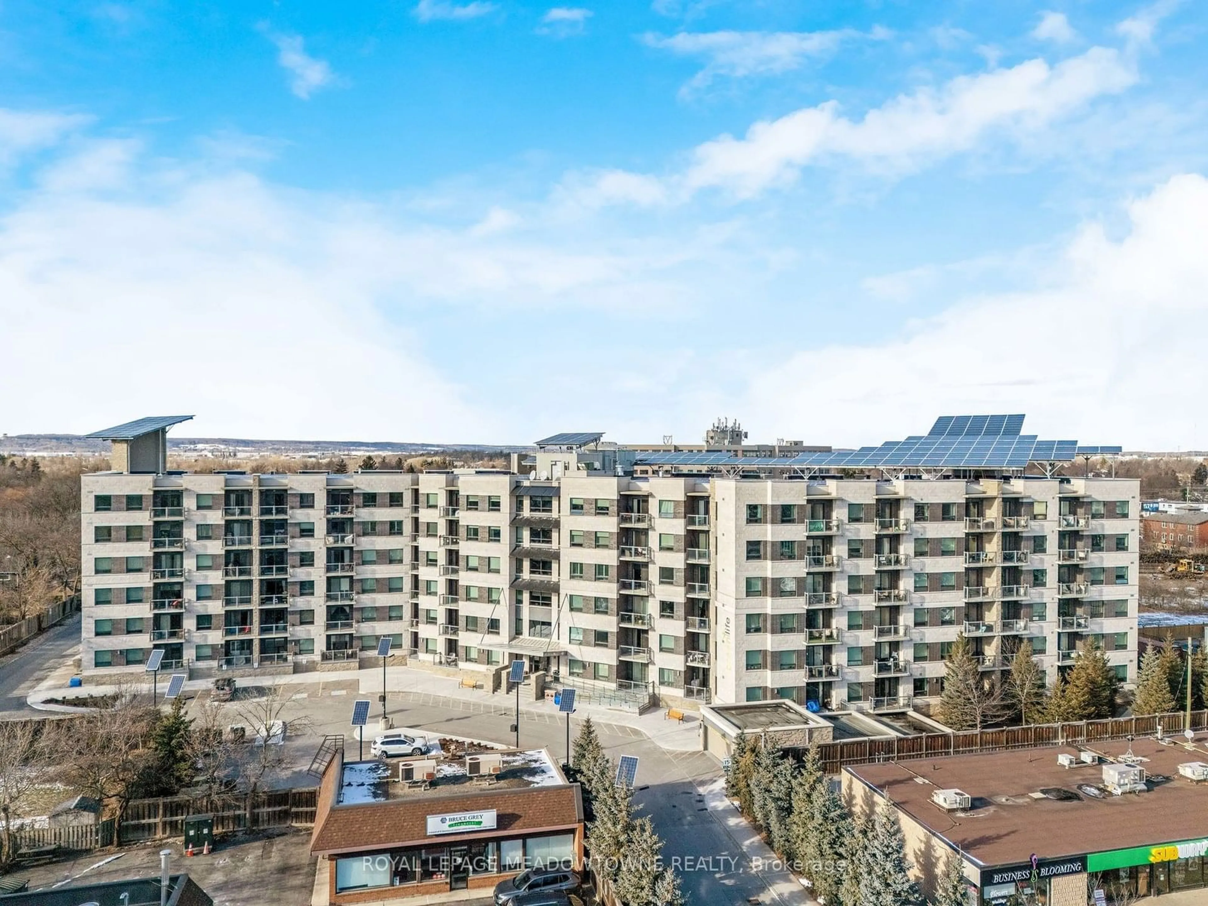 A pic from outside/outdoor area/front of a property/back of a property/a pic from drone, city buildings view from balcony for 383 Main St #103, Milton Ontario L9T 8K8