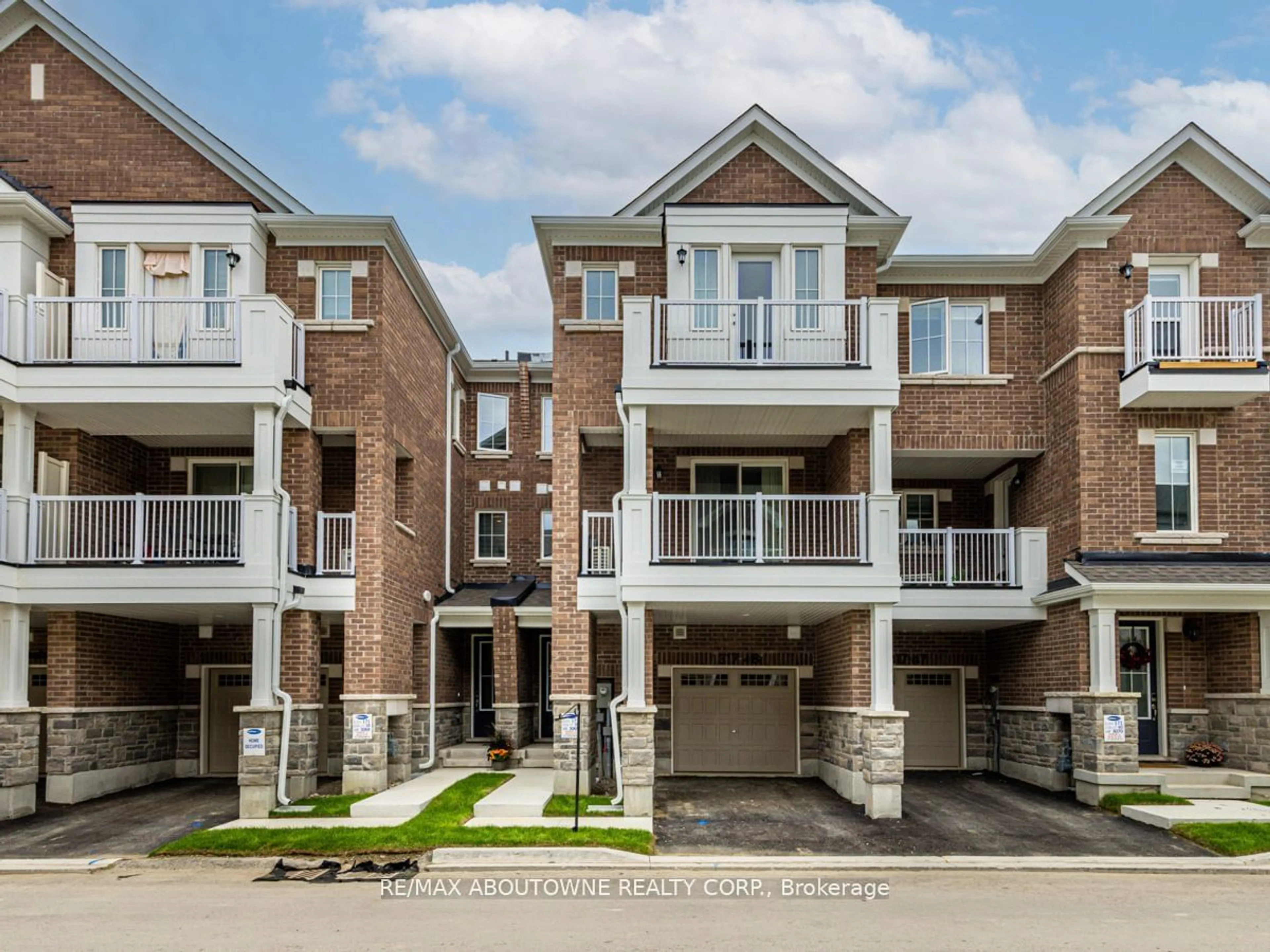 Home with brick exterior material, street for 1317 Leriche Way #48, Milton Ontario L9E 0H5