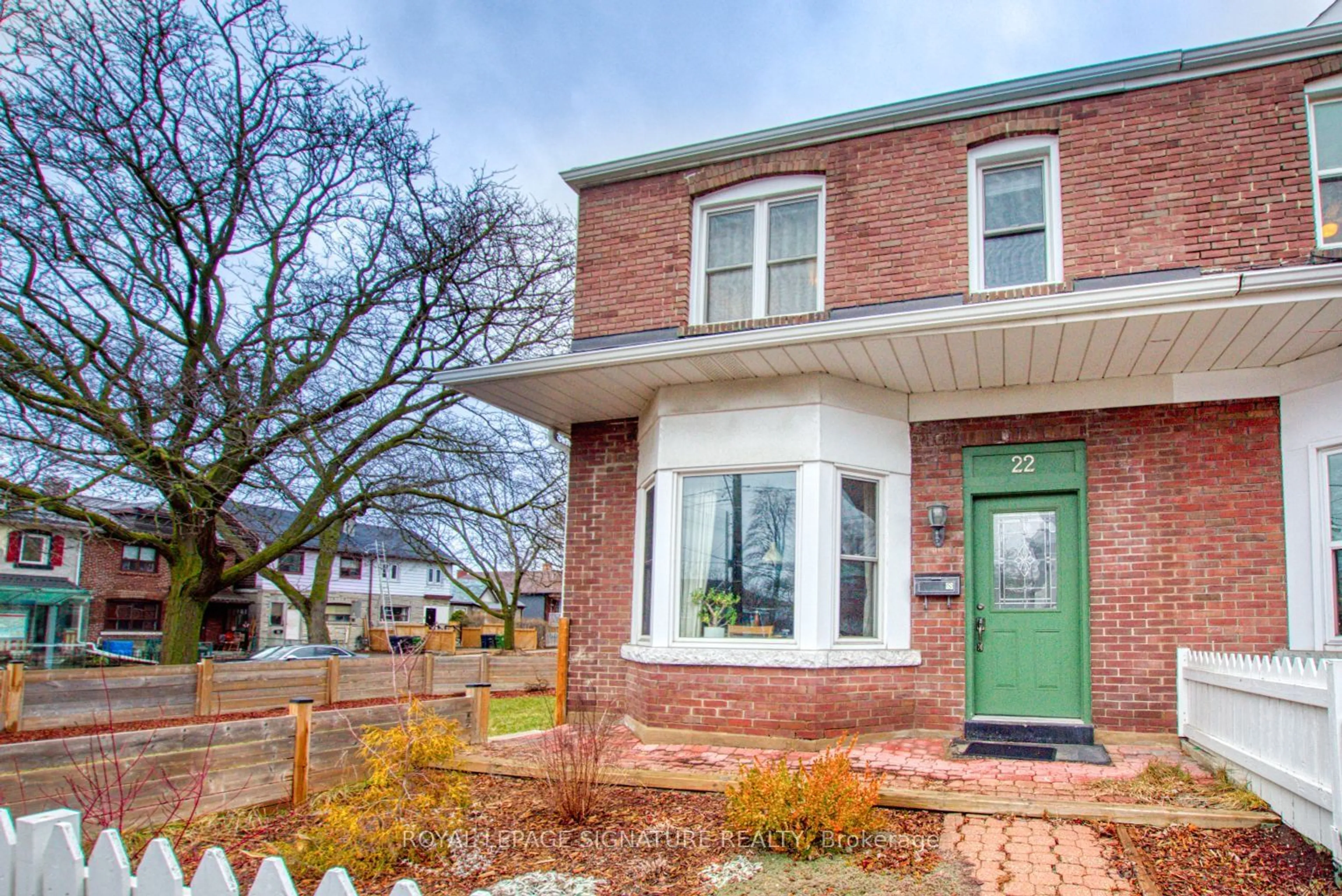 Home with brick exterior material, street for 22 Norman Ave, Toronto Ontario M6E 1G7