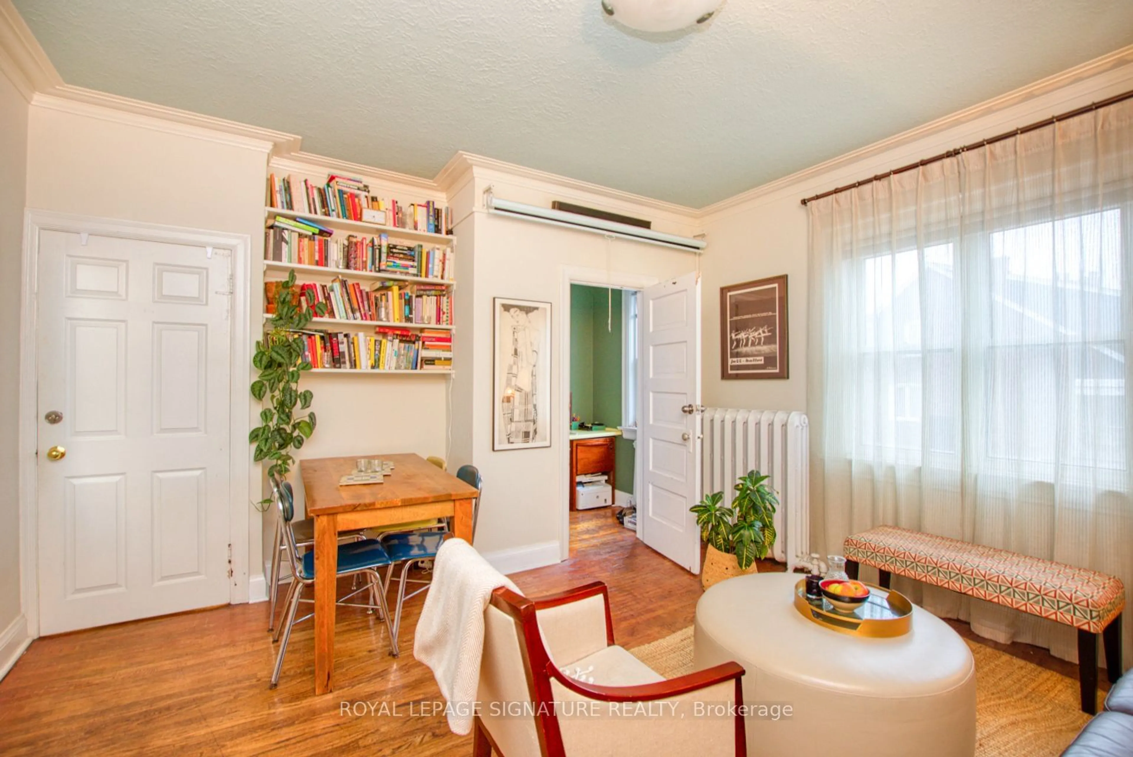 Dining room, wood/laminate floor for 22 Norman Ave, Toronto Ontario M6E 1G7