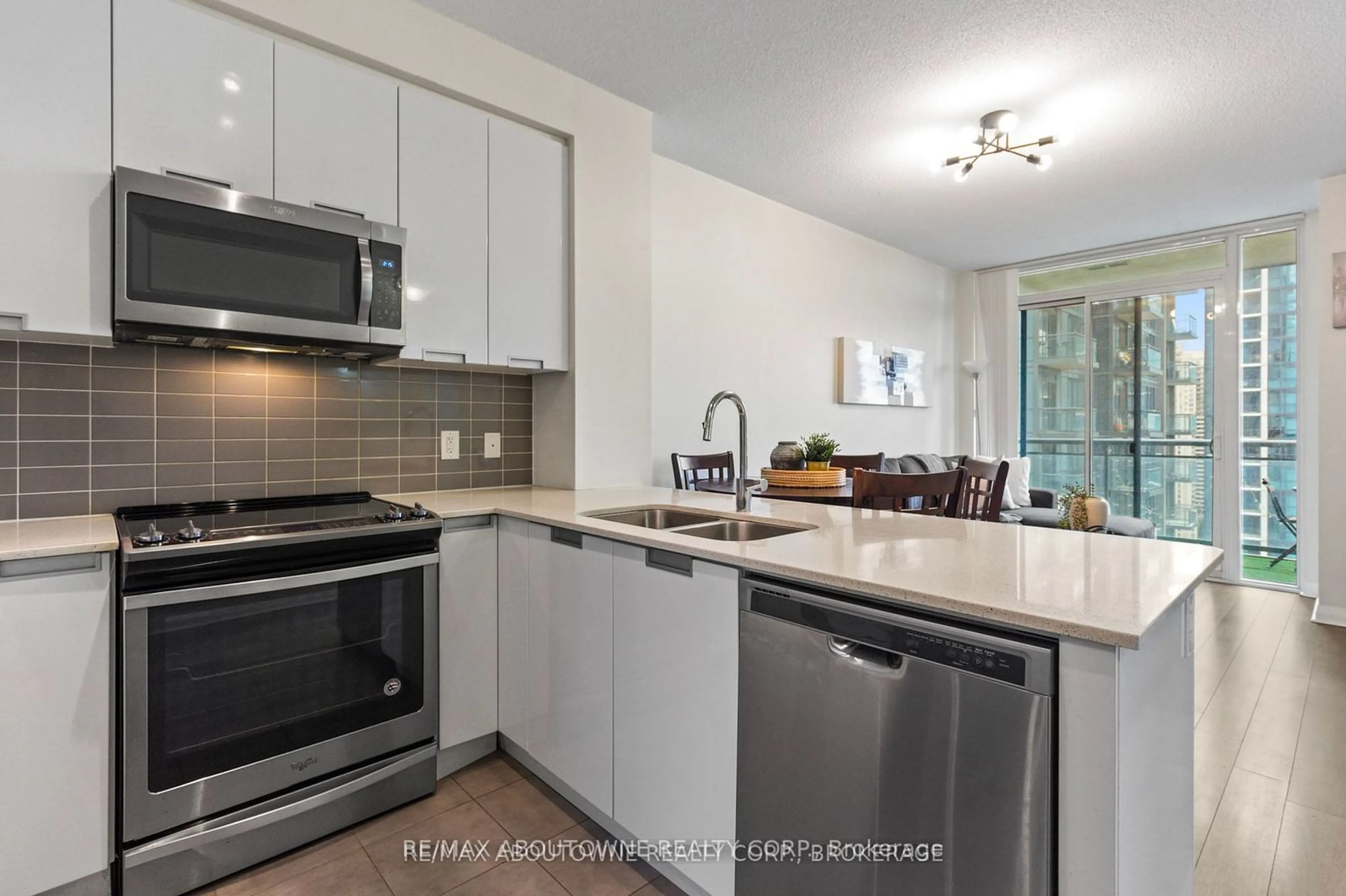 Open concept kitchen, ceramic/tile floor for 5033 Four Springs Ave #1811, Mississauga Ontario L5R 0G6