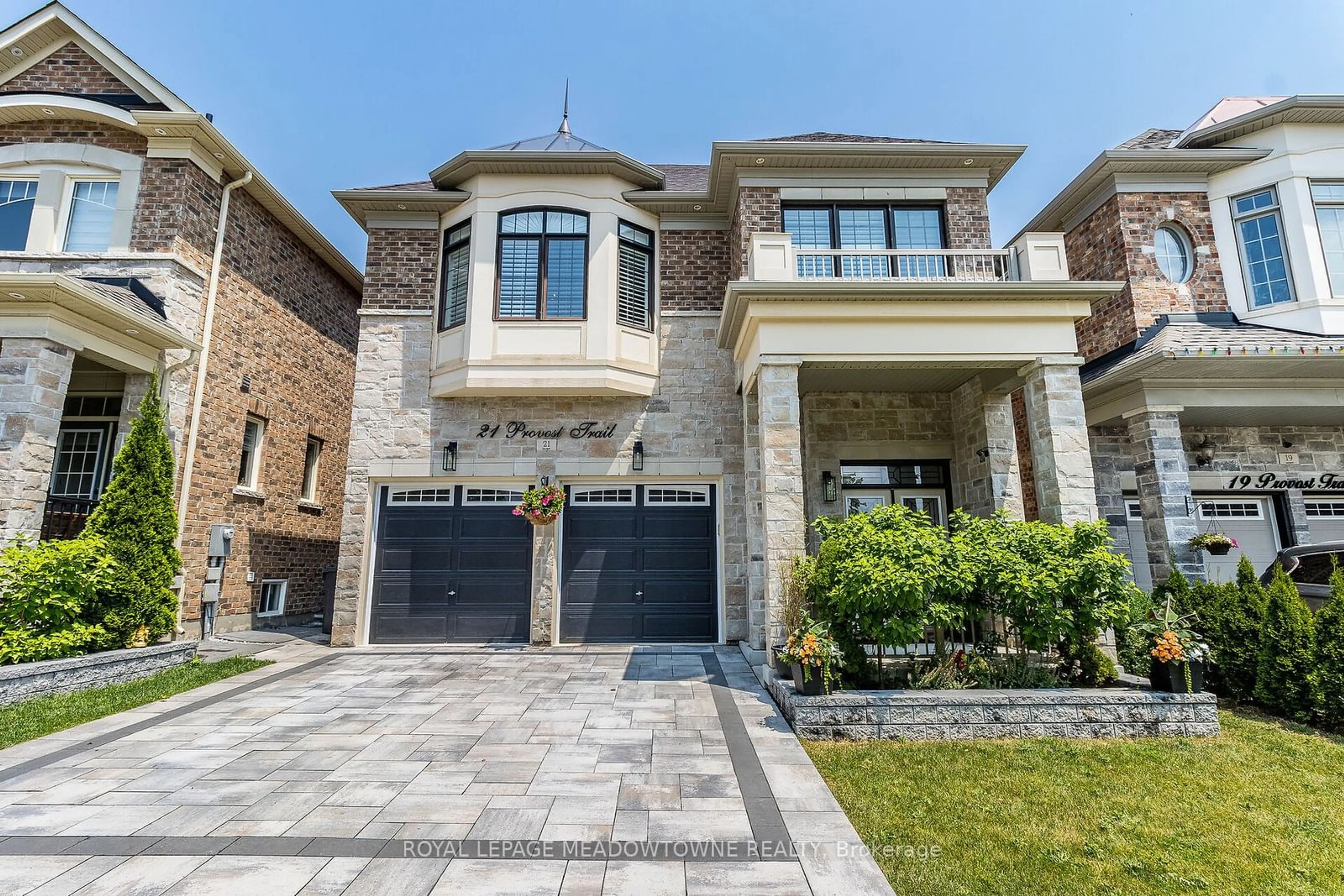 Home with brick exterior material, street for 21 Provost Tr, Brampton Ontario L6Y 6E7