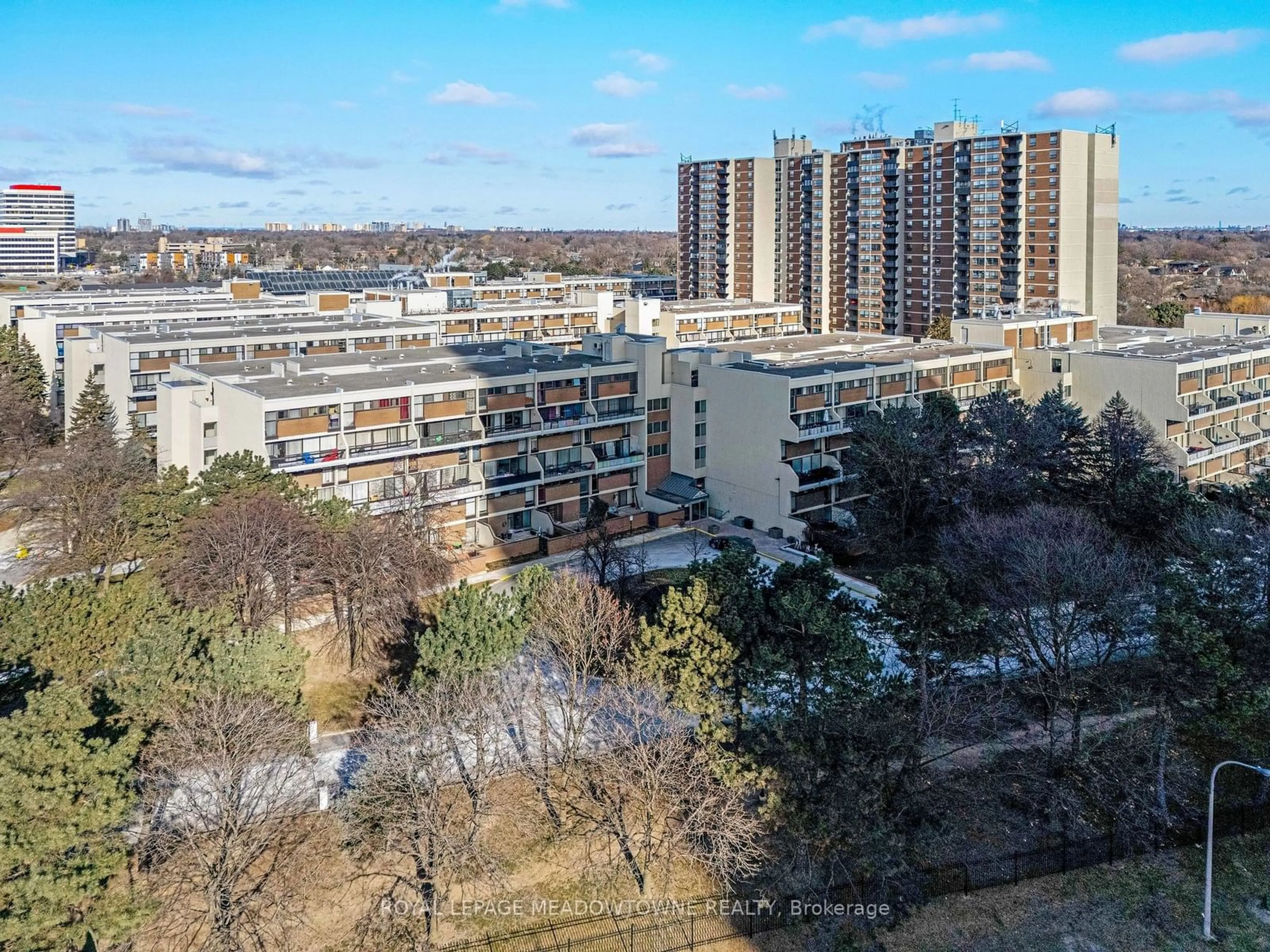 A pic from outside/outdoor area/front of a property/back of a property/a pic from drone, city buildings view from balcony for 2 Valhalla Inn Rd #215, Toronto Ontario M9B 6C3