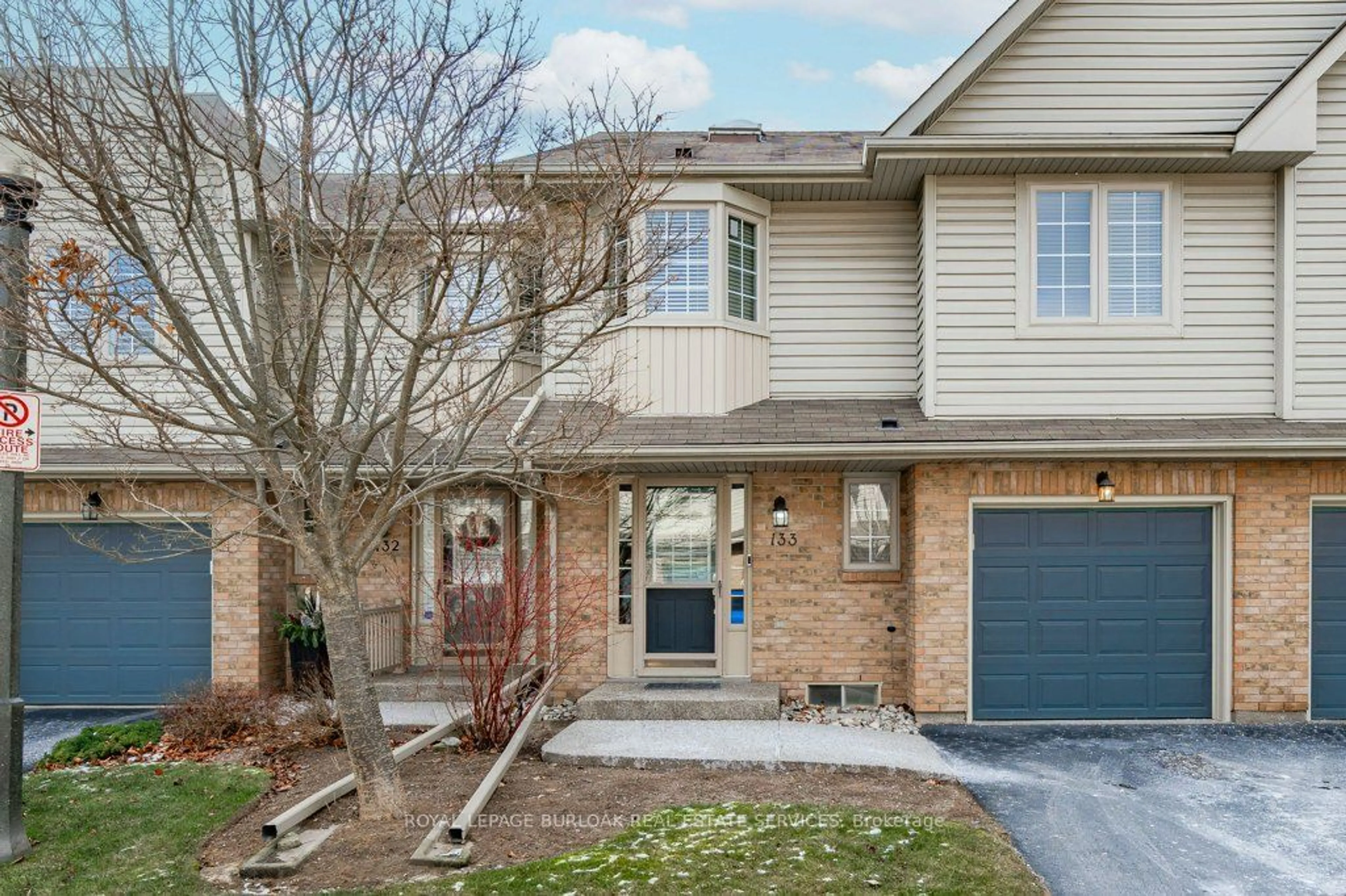 Home with brick exterior material, street for 3333 New St #133, Burlington Ontario L7N 1N1