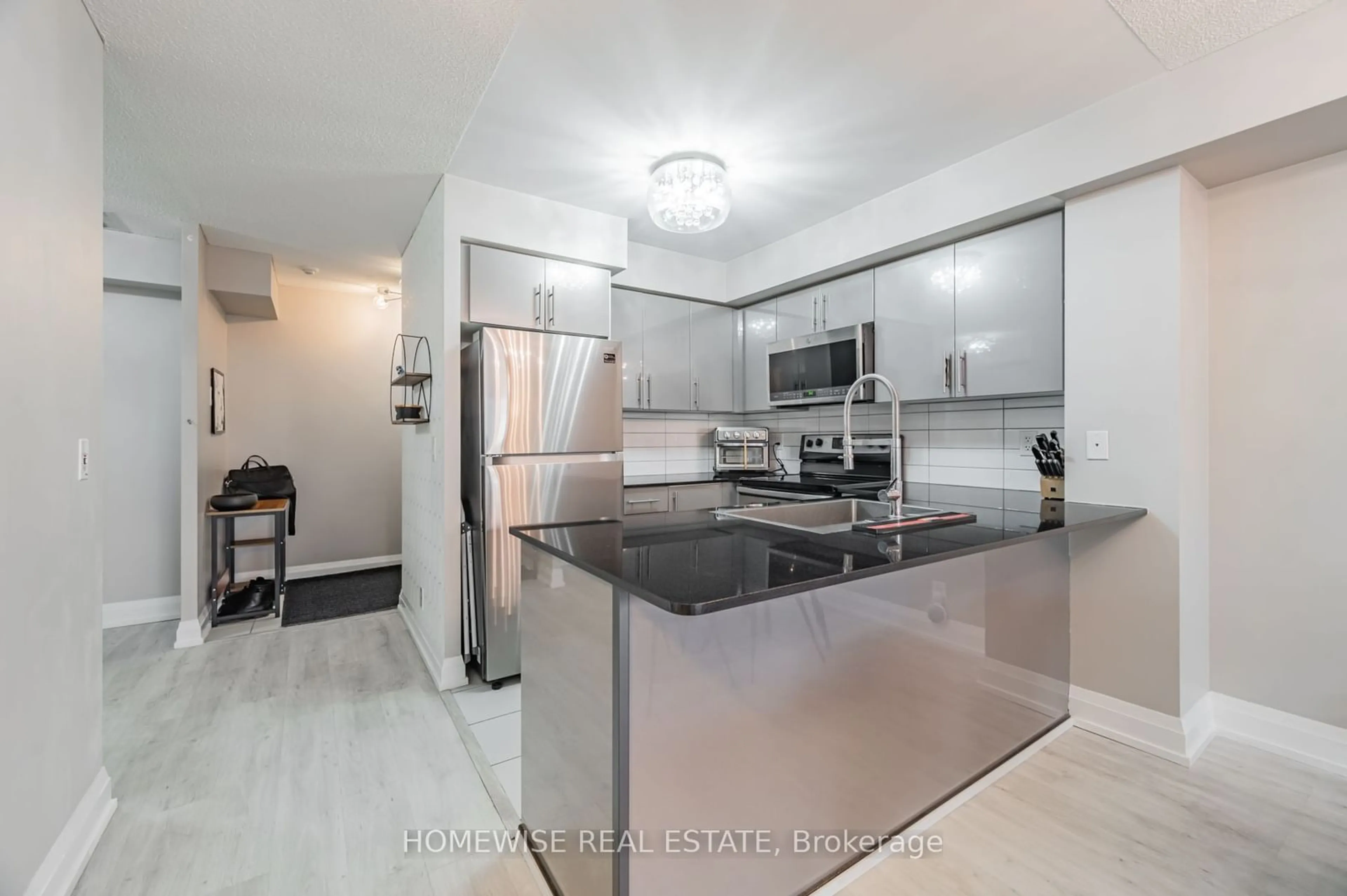 Open concept kitchen, unknown for 1070 Sheppard Ave #717, Toronto Ontario M3J 0G8