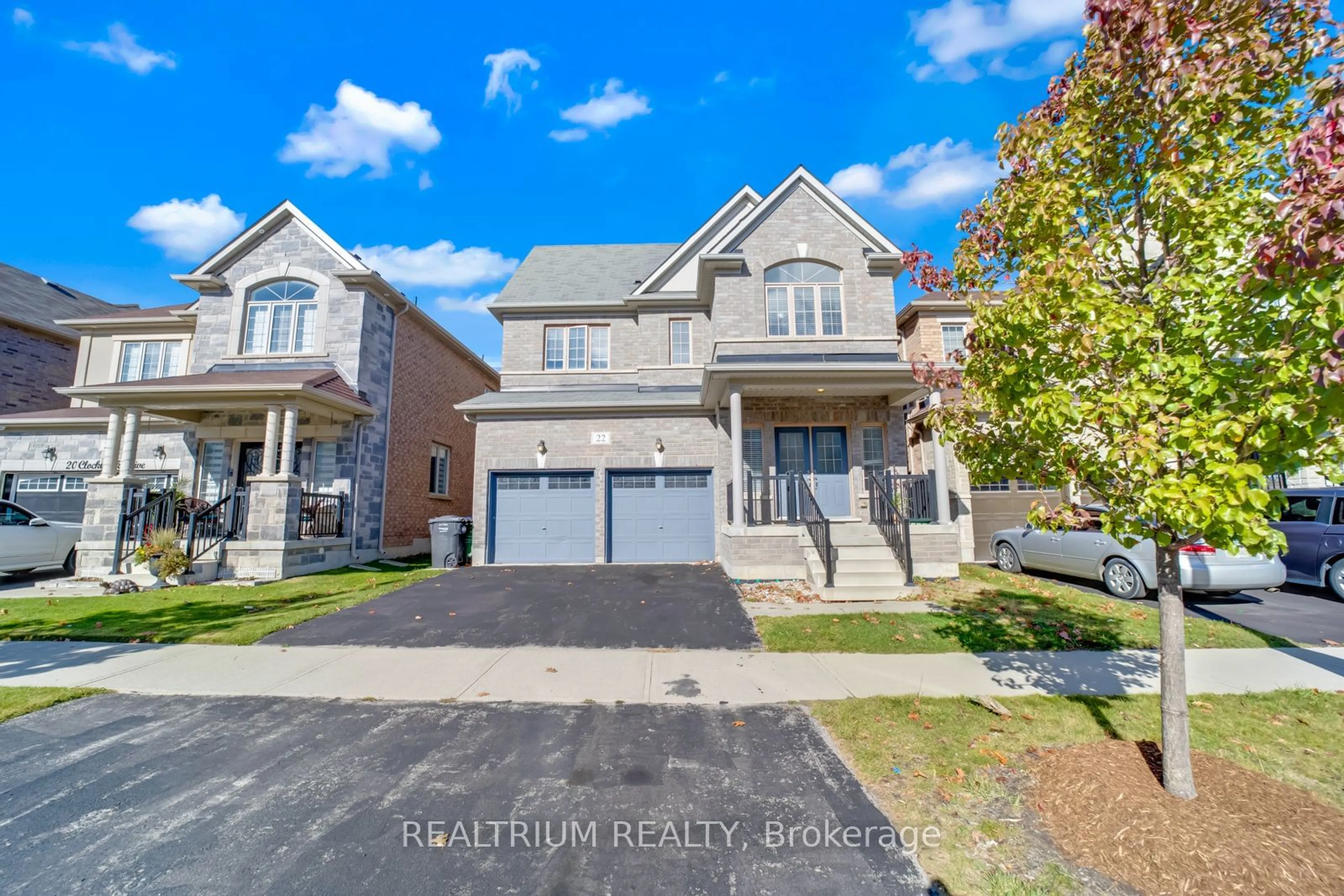 Home with brick exterior material, street for 22 Clockwork Dr, Brampton Ontario L7A 4R8