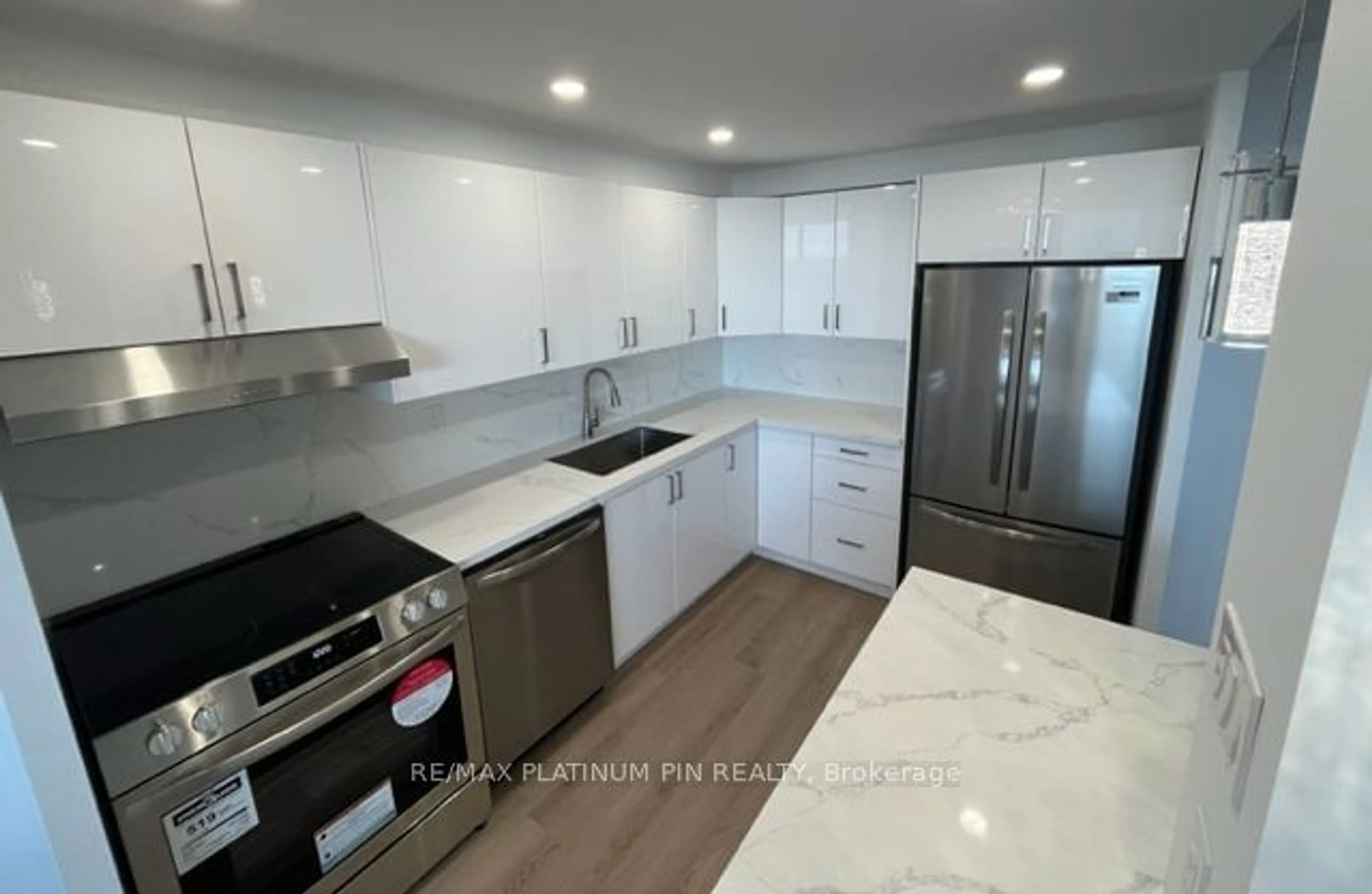 Open concept kitchen, ceramic/tile floor for 360 Ridelle Ave #2103, Toronto Ontario M6B 1K1