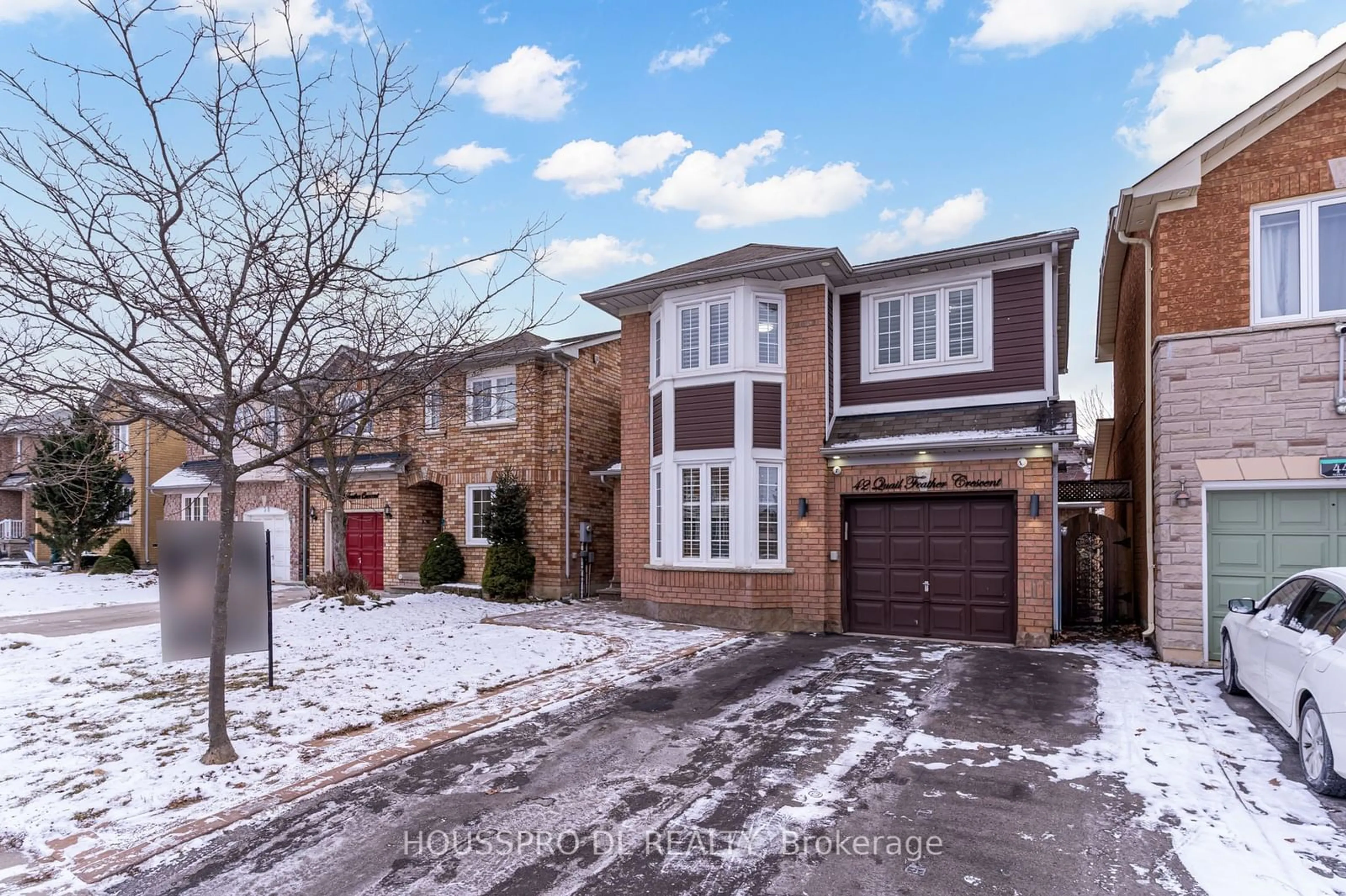 Home with brick exterior material, street for 42 Quail Feather Cres, Brampton Ontario L6R 1S7