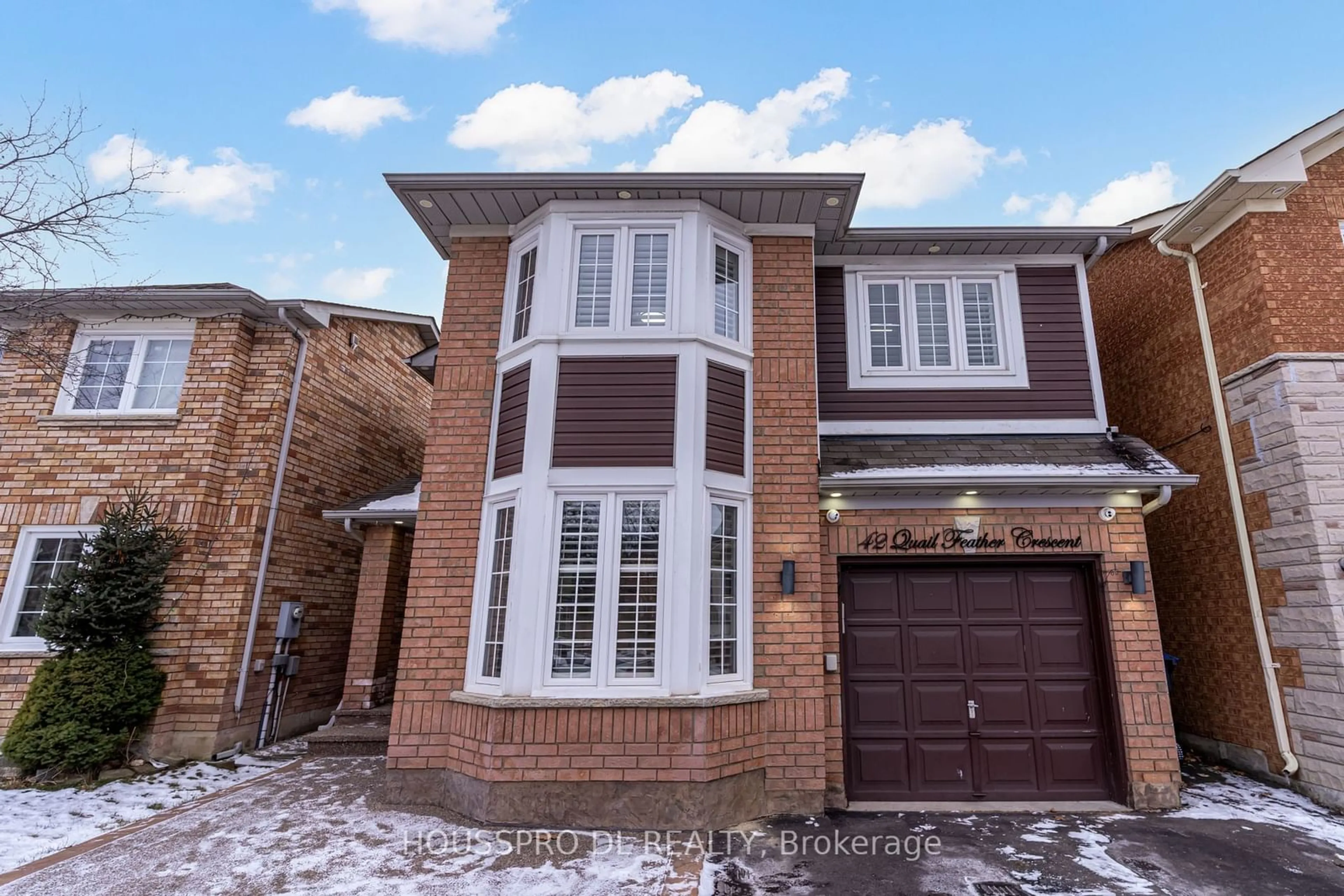 Home with brick exterior material, street for 42 Quail Feather Cres, Brampton Ontario L6R 1S7