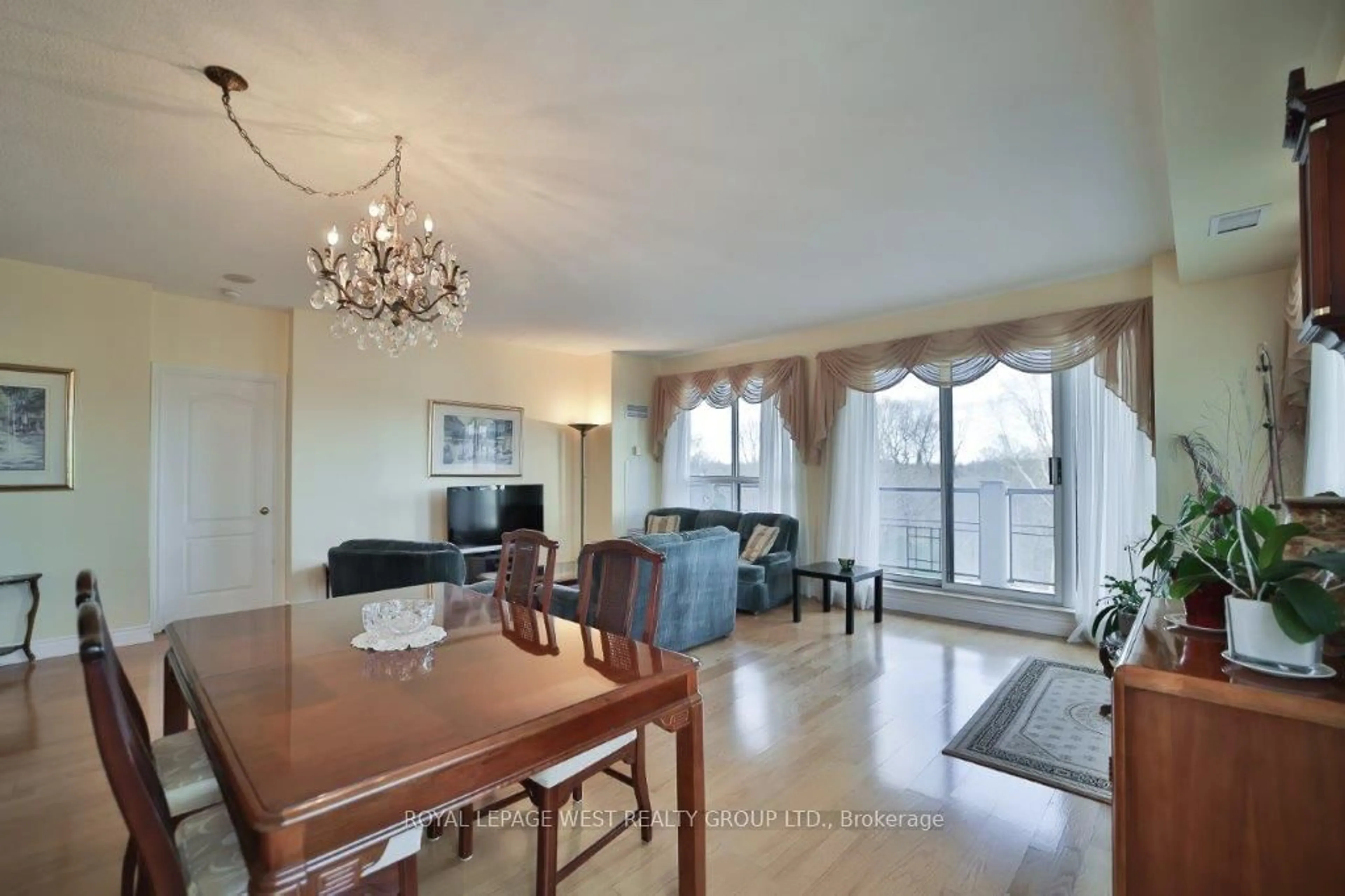 Dining room, wood/laminate floor for 2 Aberfoyle Cres #509, Toronto Ontario M8X 2Z8