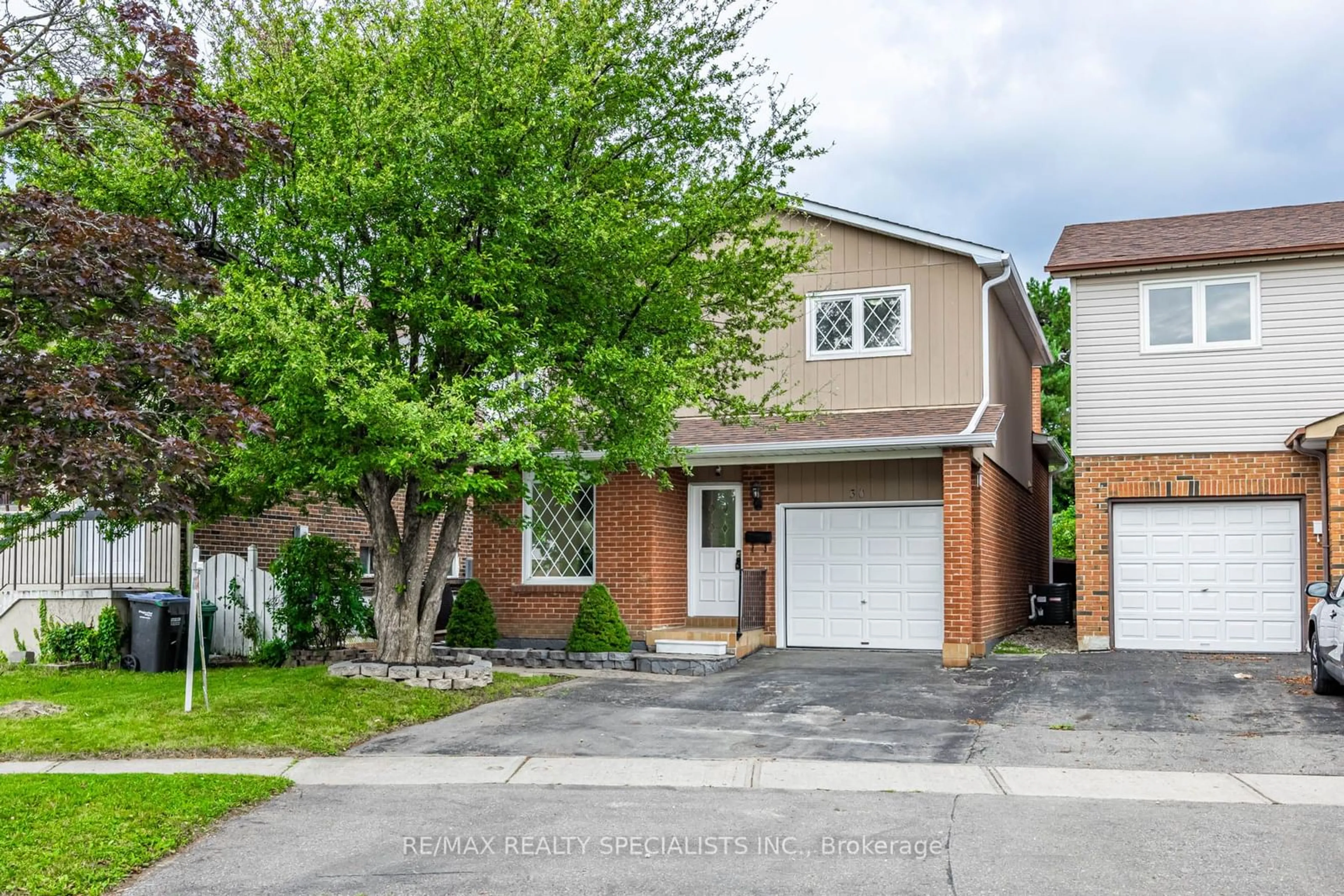 Home with brick exterior material, street for 30 Winterfold Dr, Brampton Ontario L6V 3T2